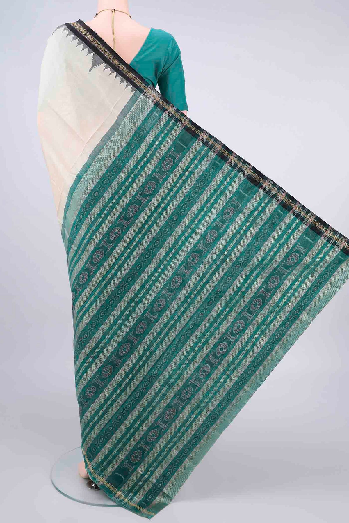 Flat view of Pure Silk Off White Orissa Saree with Plain Body and Ganga Jamuna Border. 