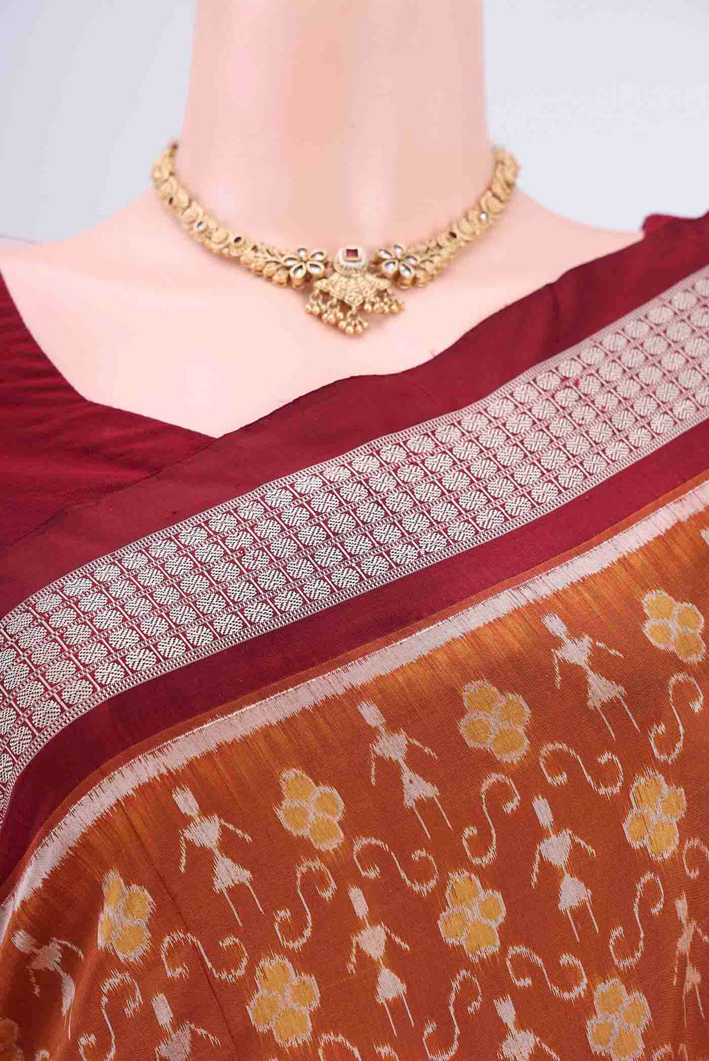 Border image of Brown Orissa Silk Saree with Ikat design on the body and Thread Border. 