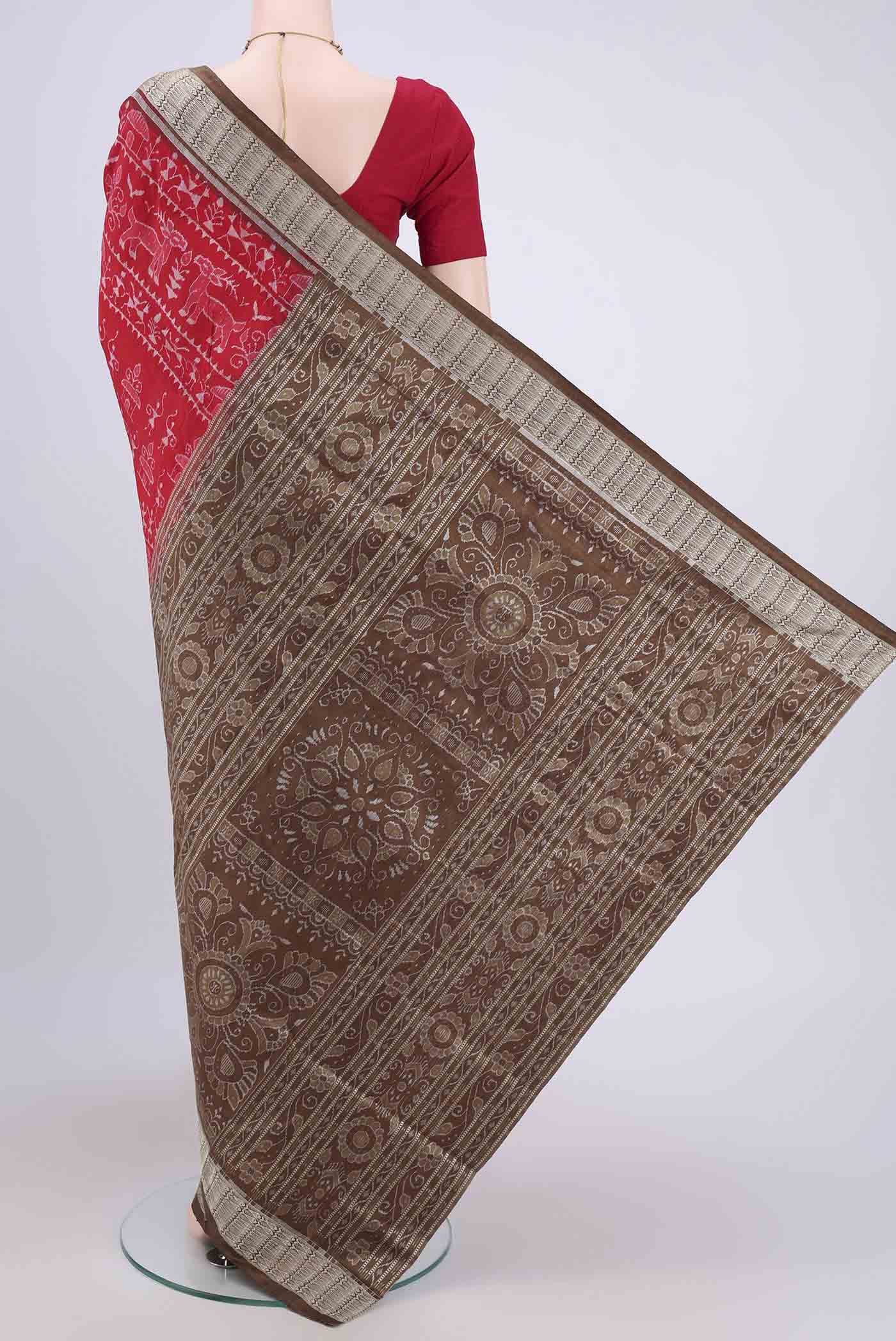 Flat view of Deep Red Orissa Silk Saree with Ikat design on the body and Thread Border. 