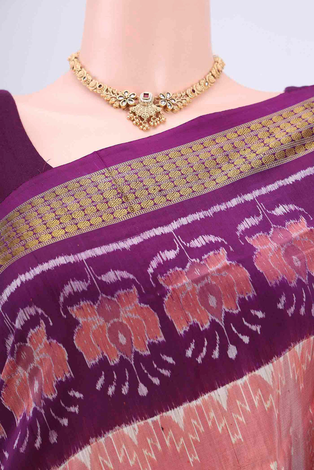 Border image of Peach Orissa Silk Saree with Ikat design on the body and Thread Border. 