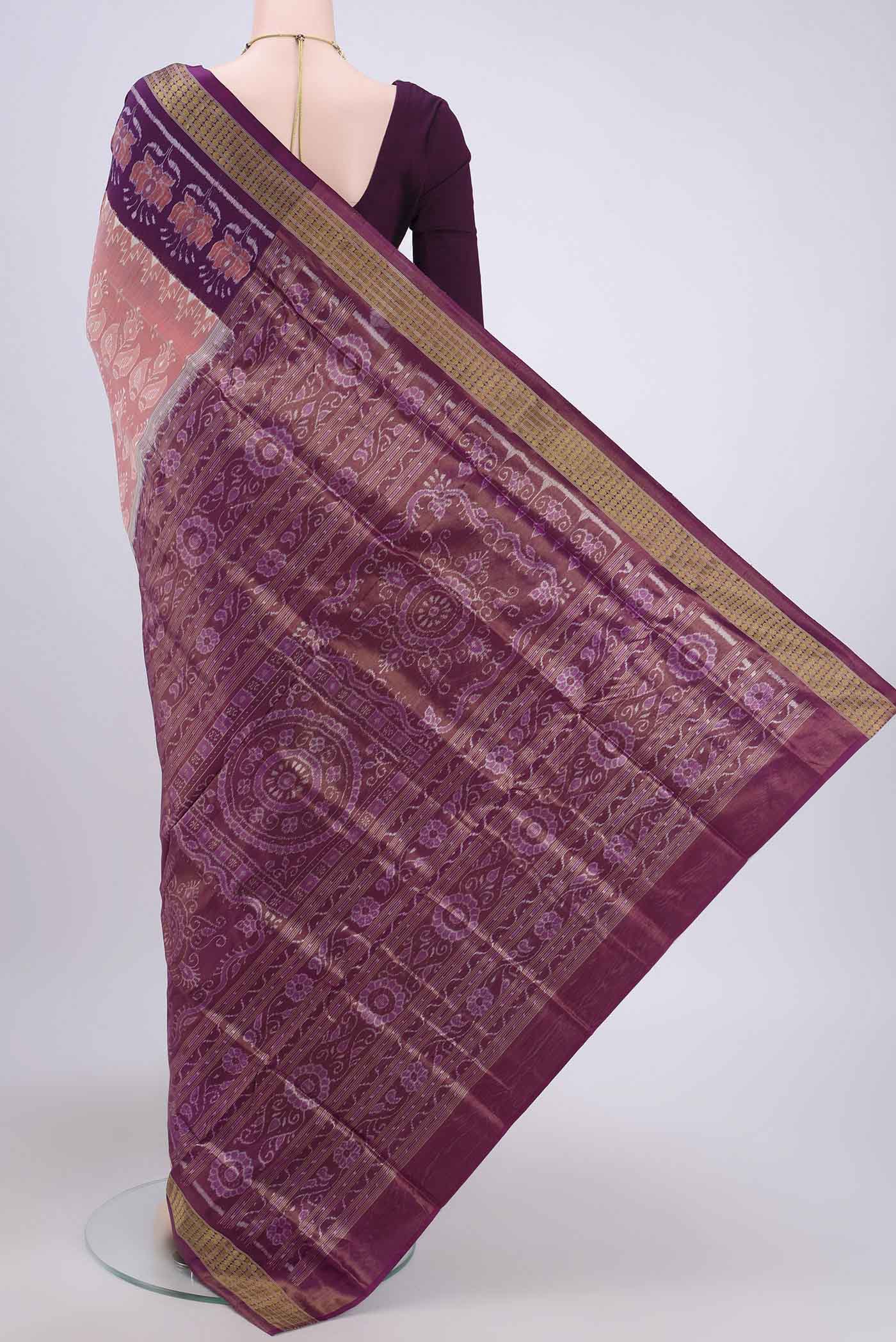 Flat view of Peach Orissa Silk Saree with Ikat design on the body and Thread Border. 