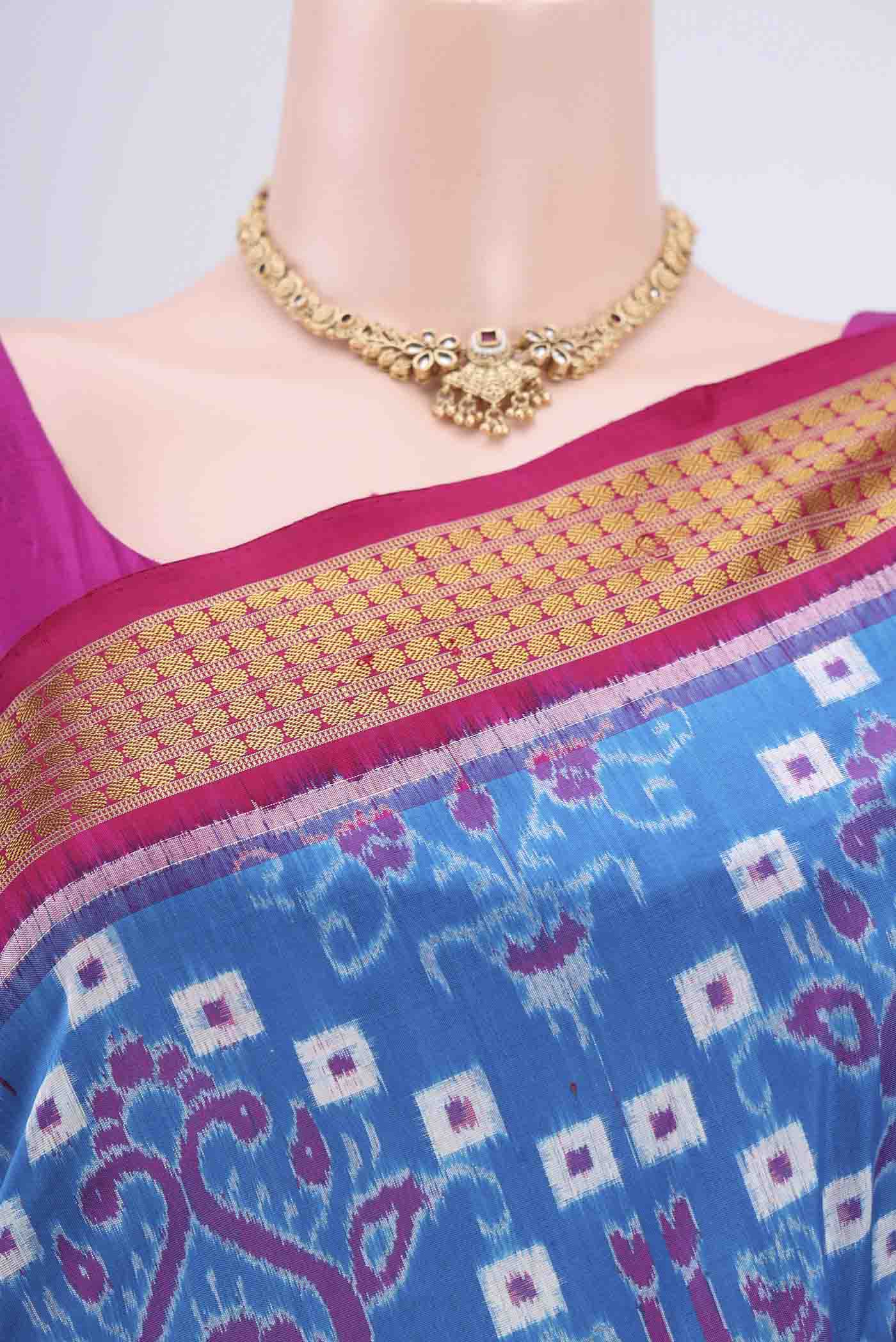 Border image of Blue Orissa Silk Saree with Ikat design on the body and Thread Border. 
