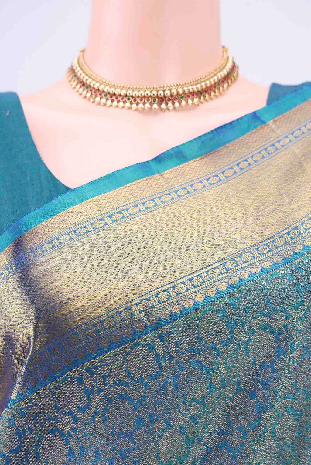 Border image of Pure Silk Pure Zari Sea Green Kanjivaram Saree with Zari Brocade on the body and Zari Border. 