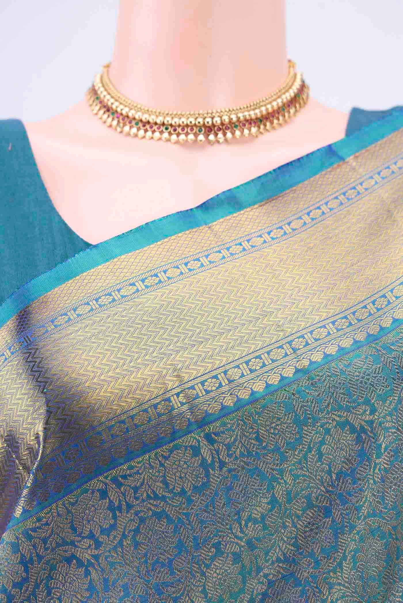 Border image of Pure Silk Pure Zari Sea Green Kanjivaram Saree with Zari Brocade on the body and Zari Border. 