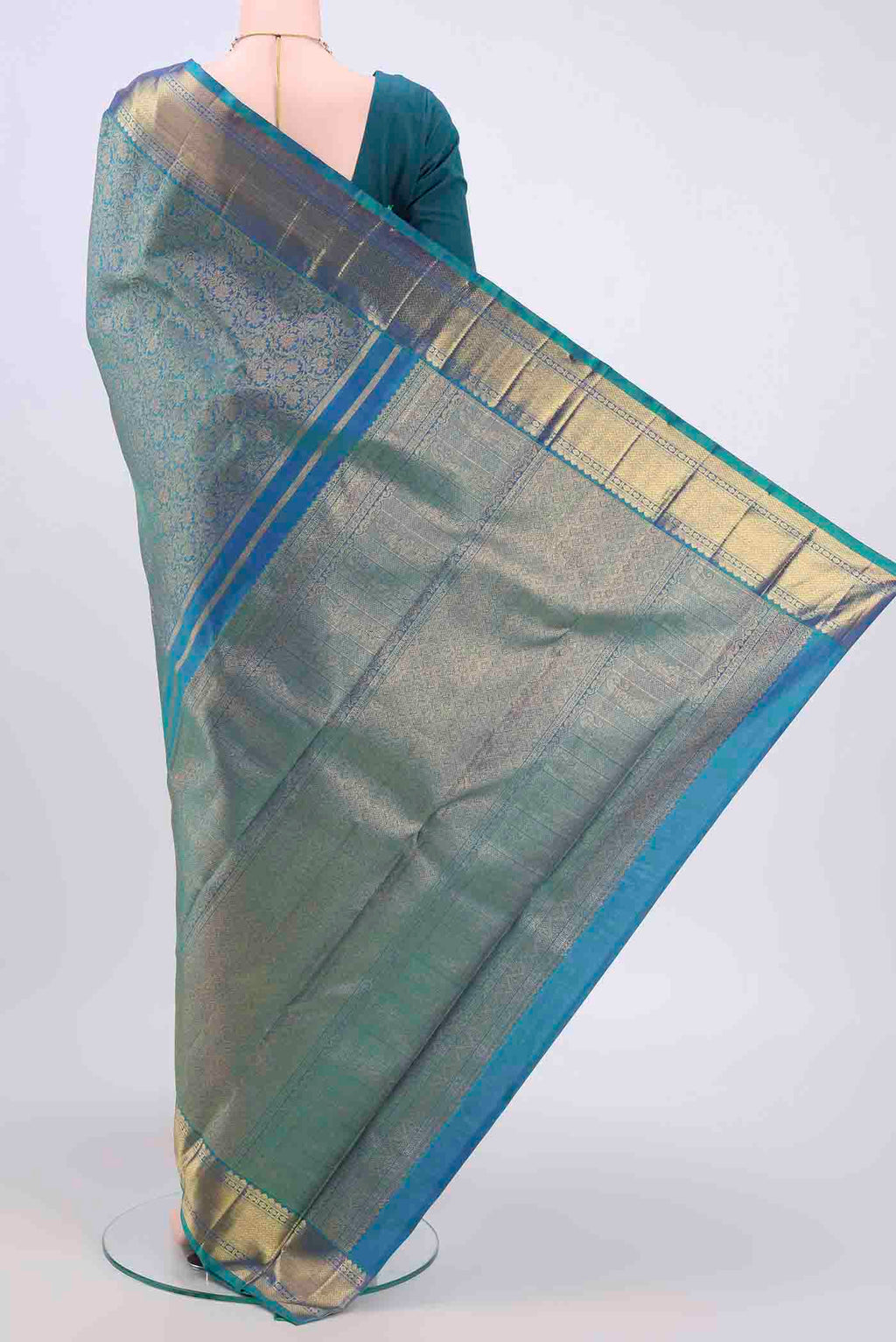 Flat view of Pure Silk Pure Zari Sea Green Kanjivaram Saree with Zari Brocade on the body and Zari Border. 
