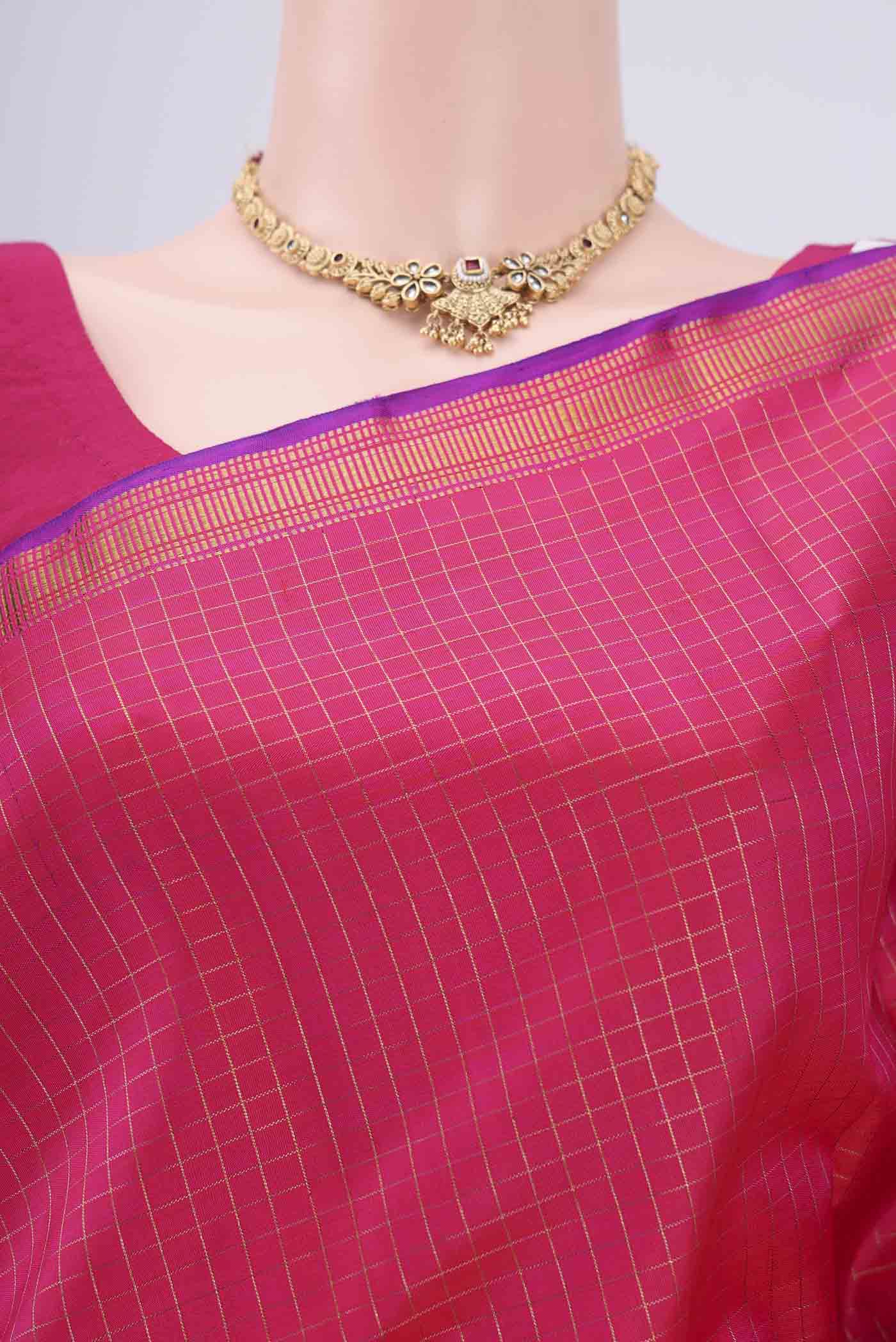 Border image of Pure Silk Pure Zari Dark Pink Kanchipuram Saree with Checked design on the body and Temple Border. 