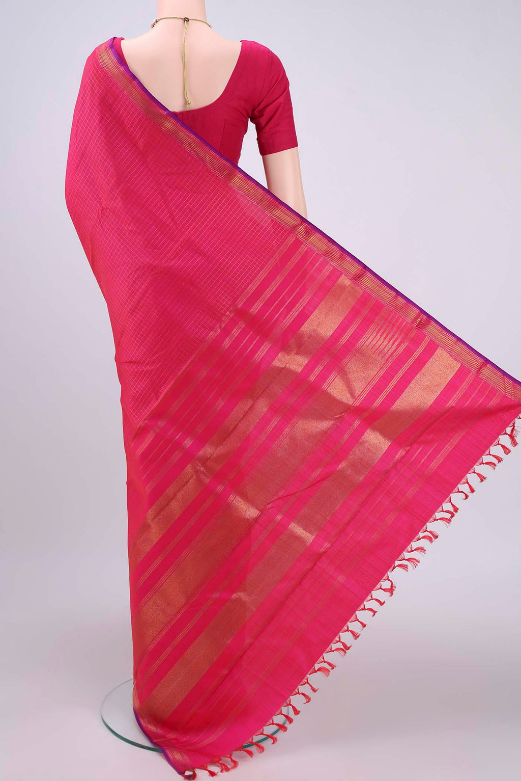 Flat view of Pure Silk Pure Zari Dark Pink Kanchipuram Saree with Checked design on the body and Temple Border. 