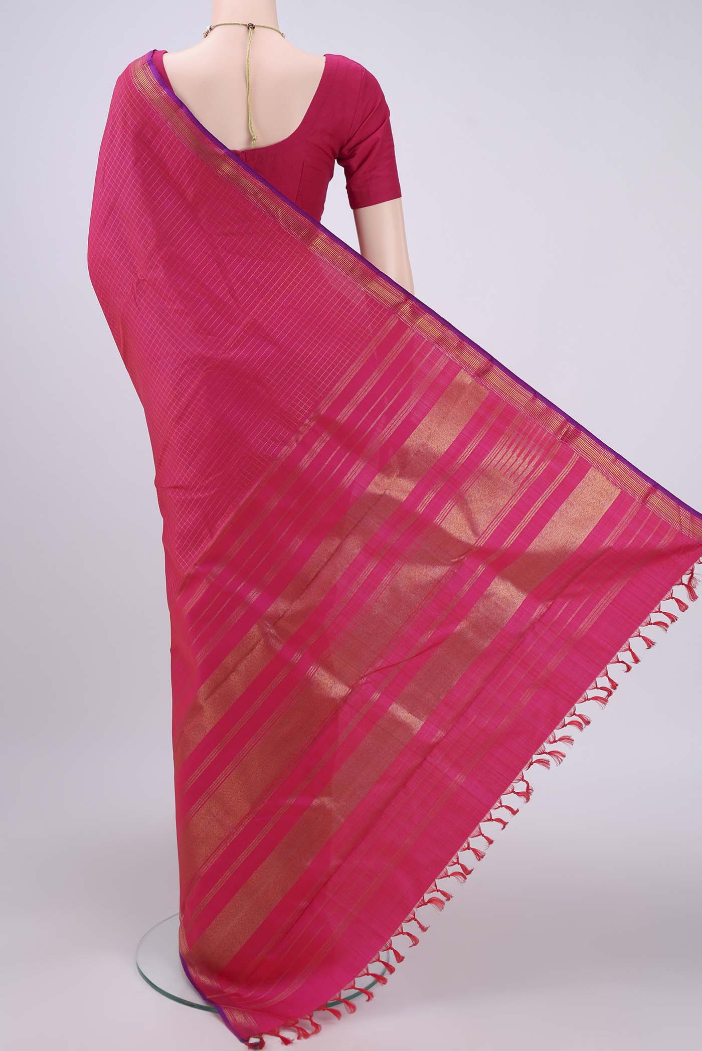 Flat view of Pure Silk Pure Zari Dark Pink Kanchipuram Saree with Checked design on the body and Temple Border. 