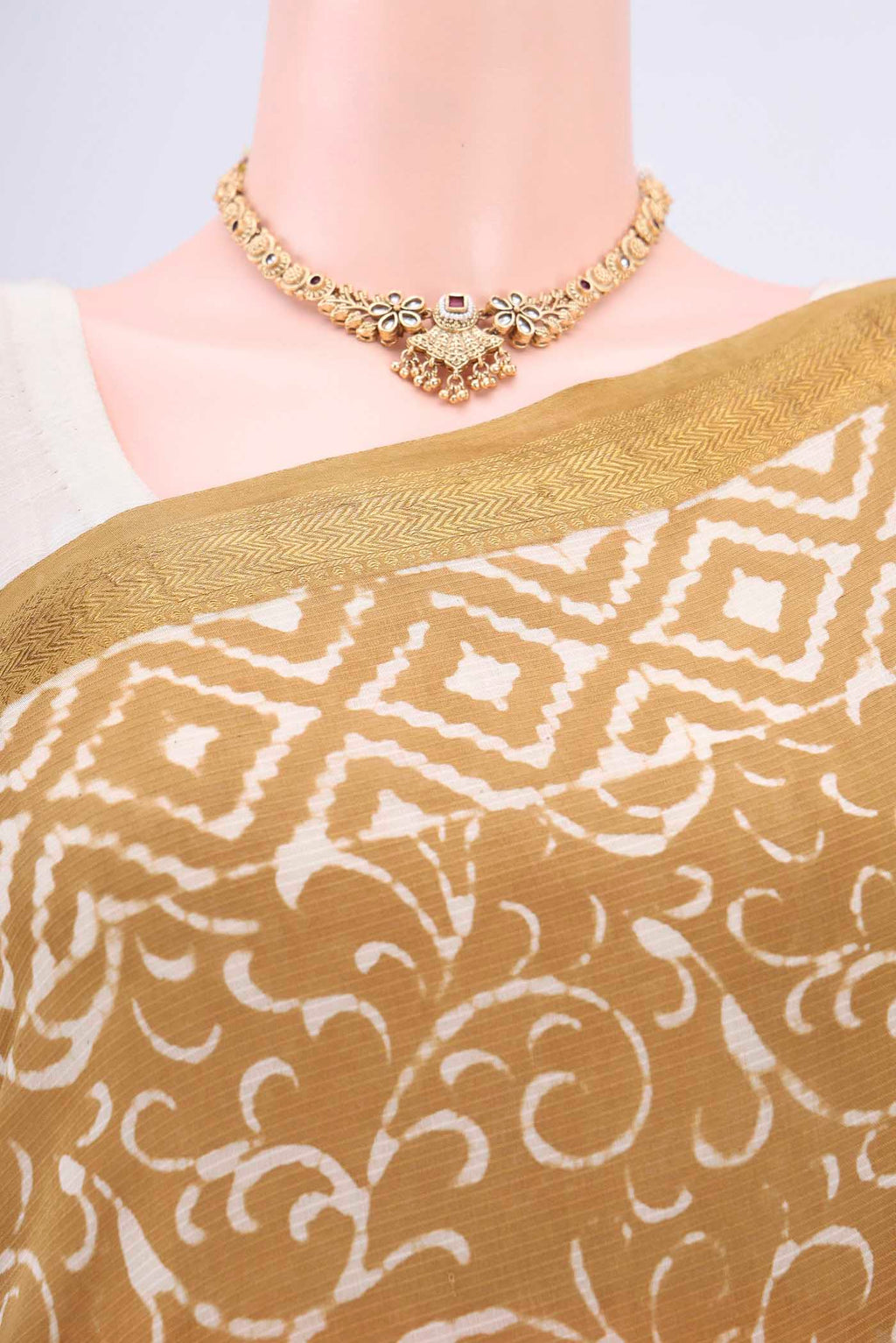 Border image of Mustard Maheshwari Silk Cotton Saree with Printed design on the body and Zari Border. 