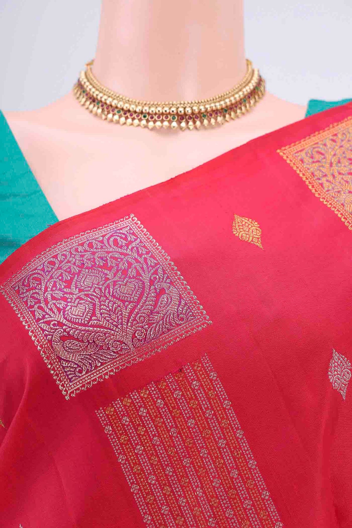 Border image of Pure Silk Pure Zari Red Kanchipuram Saree with Zari Butta on the body and Zari Border