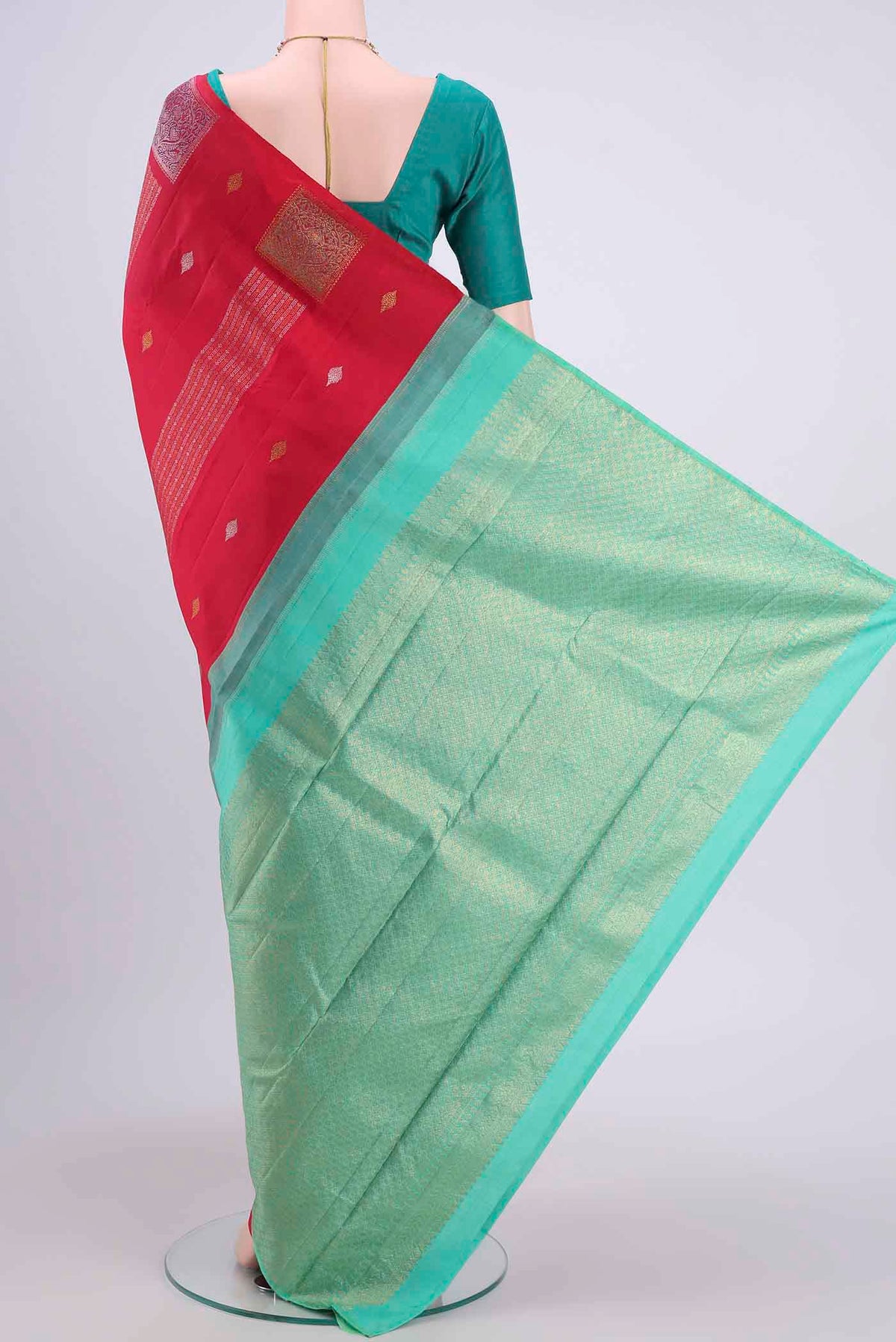 Flat view of Pure Silk Pure Zari Red Kanchipuram Saree with Zari Butta on the body and Zari Border