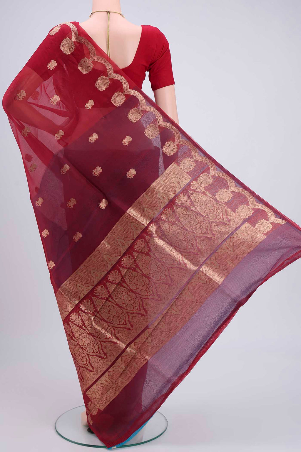 Flat view of Red Organza Silk Saree with Plain Body and Zari Border. 