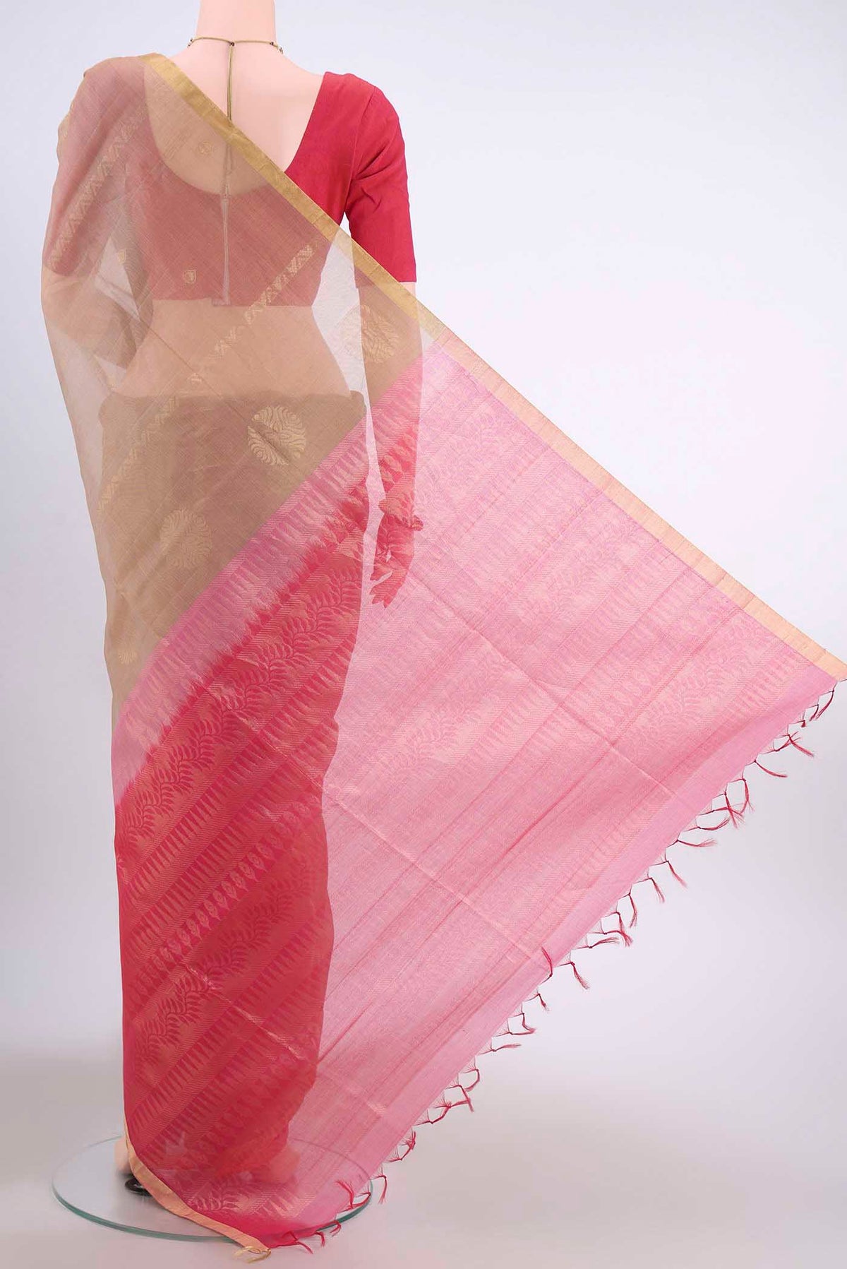 Flat view of Dark Beige Kora Cotton Saree with Zari Butta on the body and Zari Border
