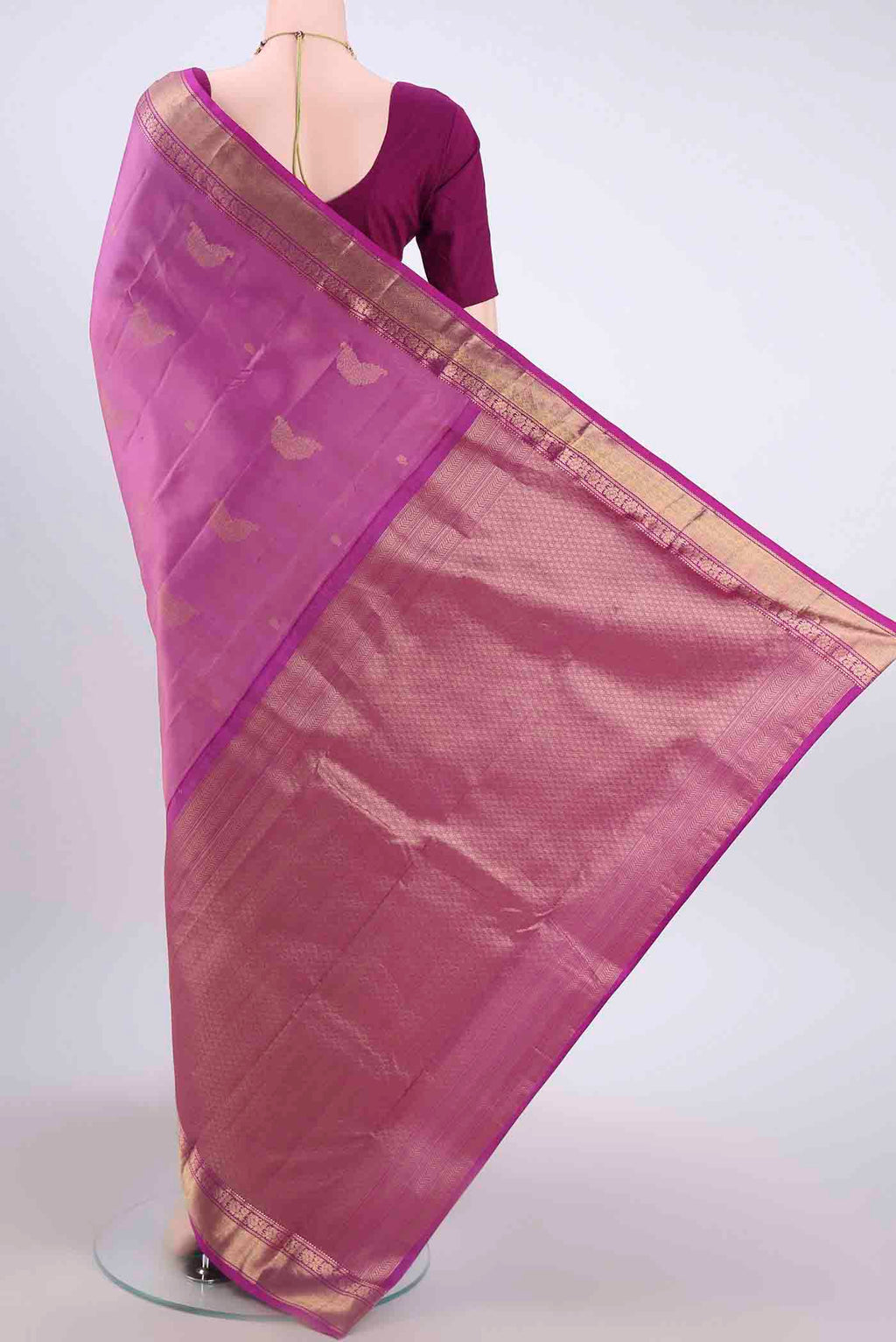 Flat view of Lavender Kanchipuram Silk Saree with Zari Butta on the body and Zari Border