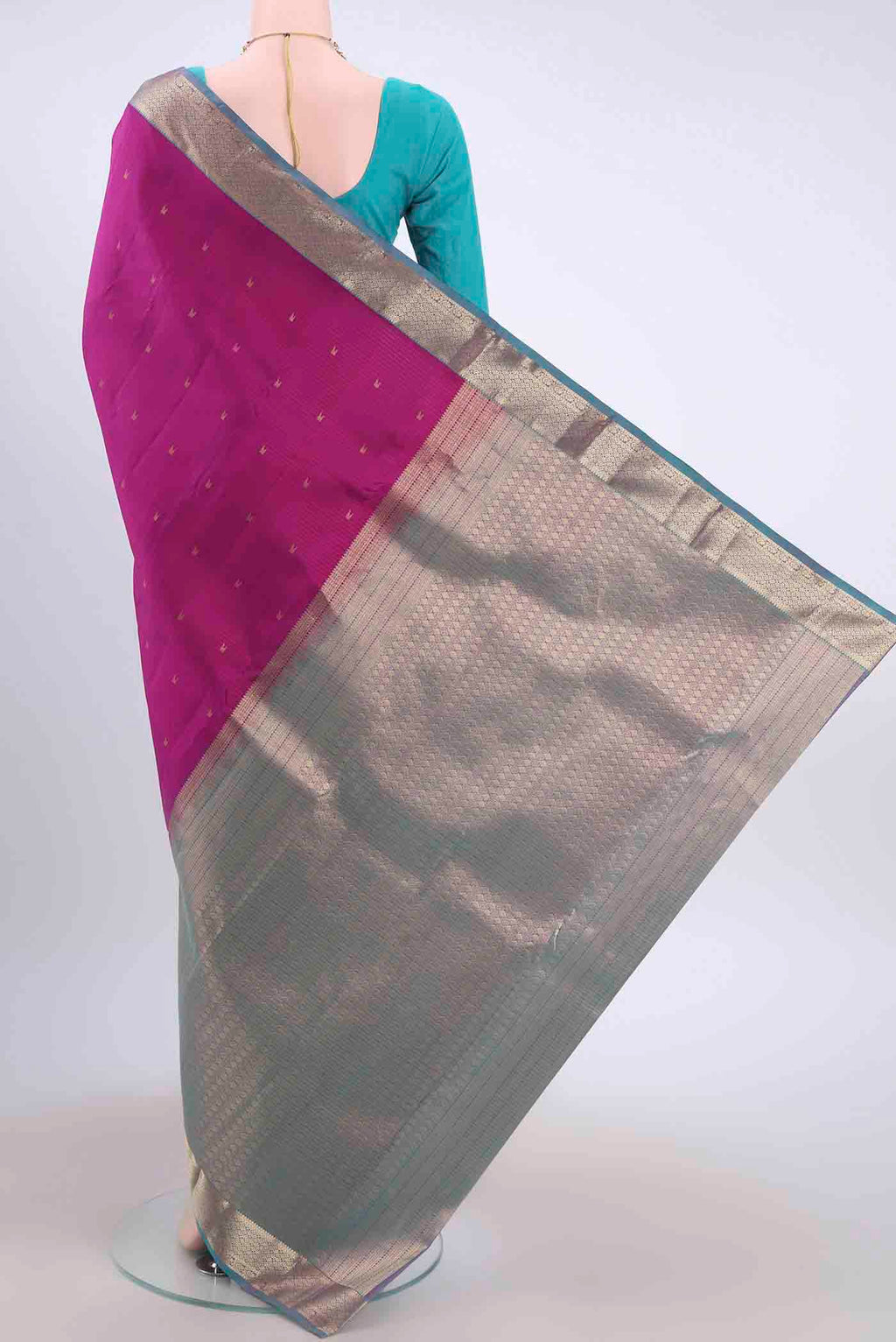 Flat view of Magenta Nangavalli Silk [ Salem ] Saree with Zari Butta on the body and Zari Border