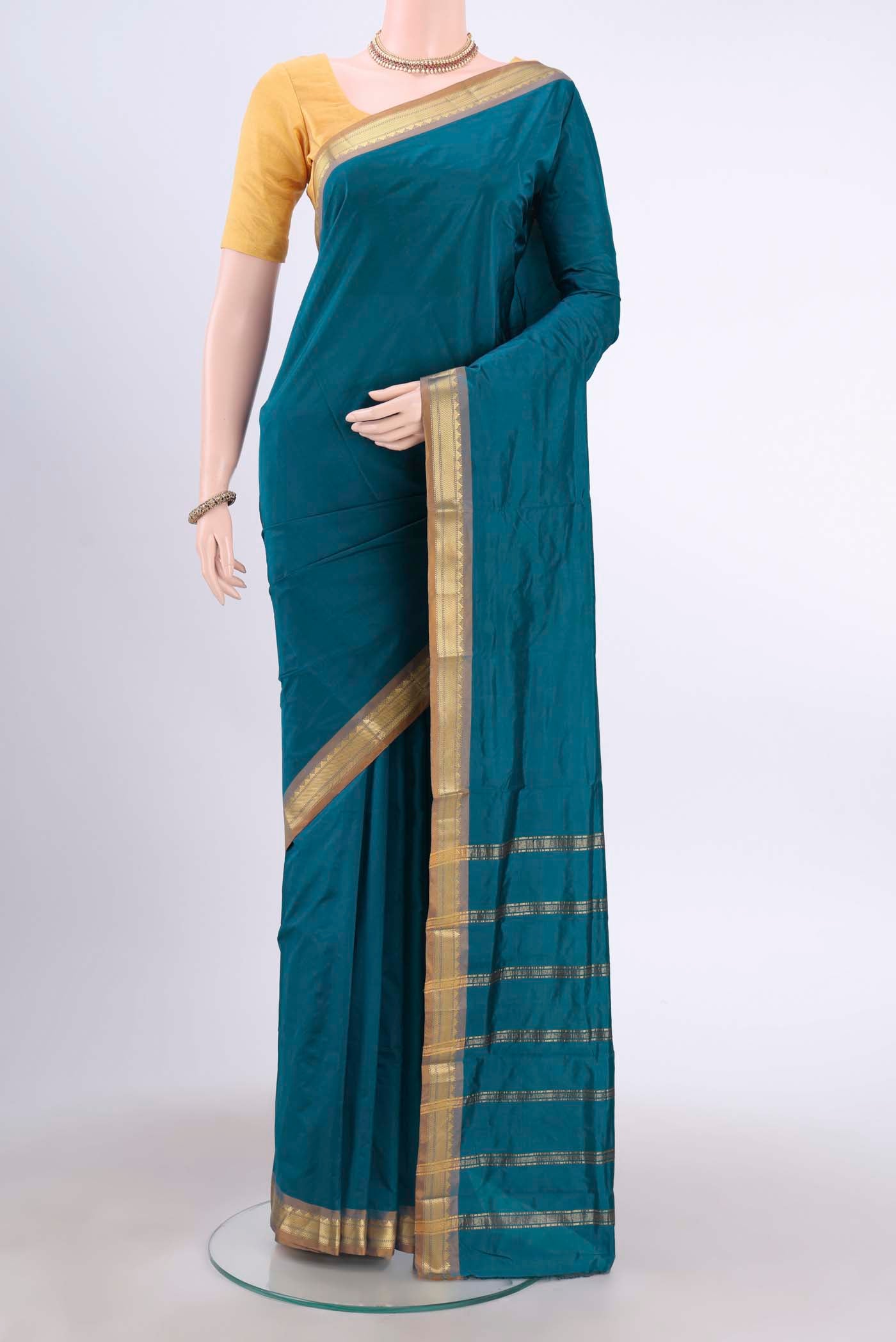 Dark Blue Dual Tone Blended Bangalore Silk Saree with Plain Body and Zari Border displayed on a mannequin