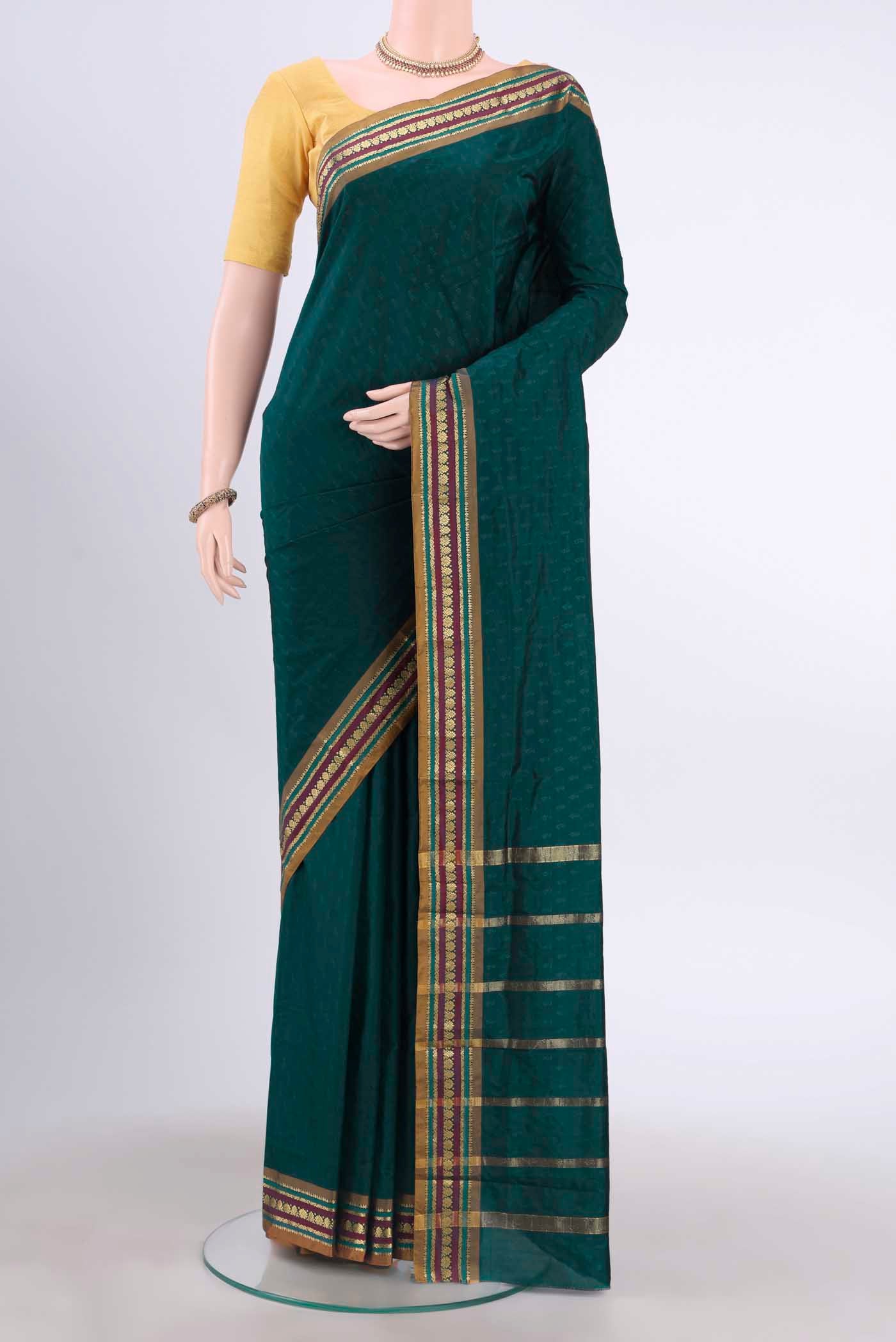 Navy Blue Dual Tone Blended Bangalore Silk Saree with Jacquard design on the body and Zari Border displayed on a mannequin