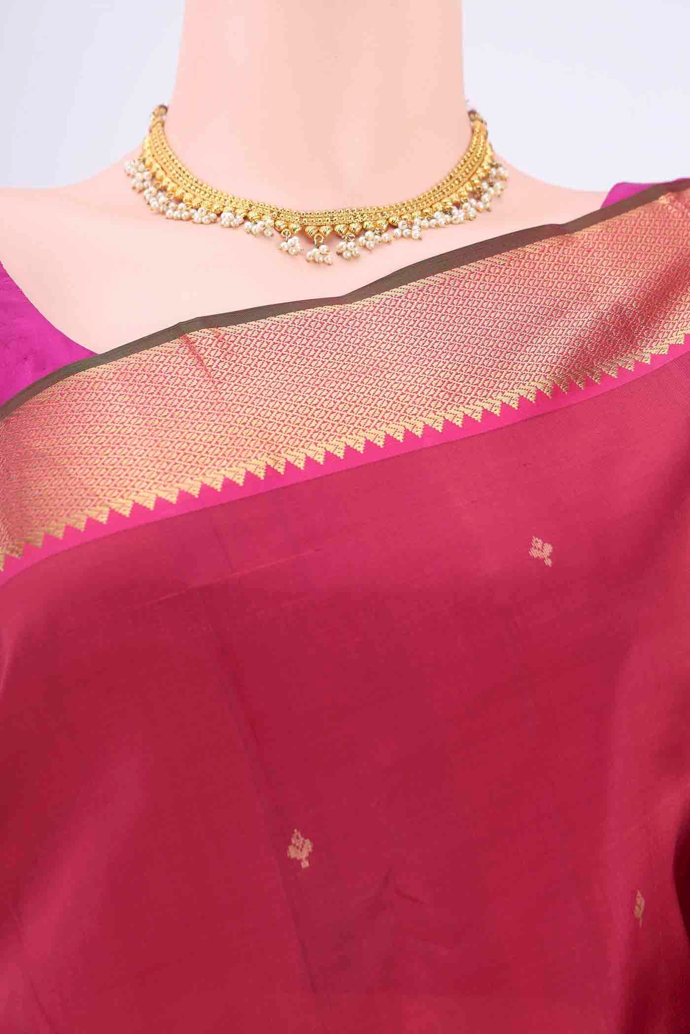 Border image of Maroon Kanchipuram Silk Saree with Zari Butta on the body and Zari Border