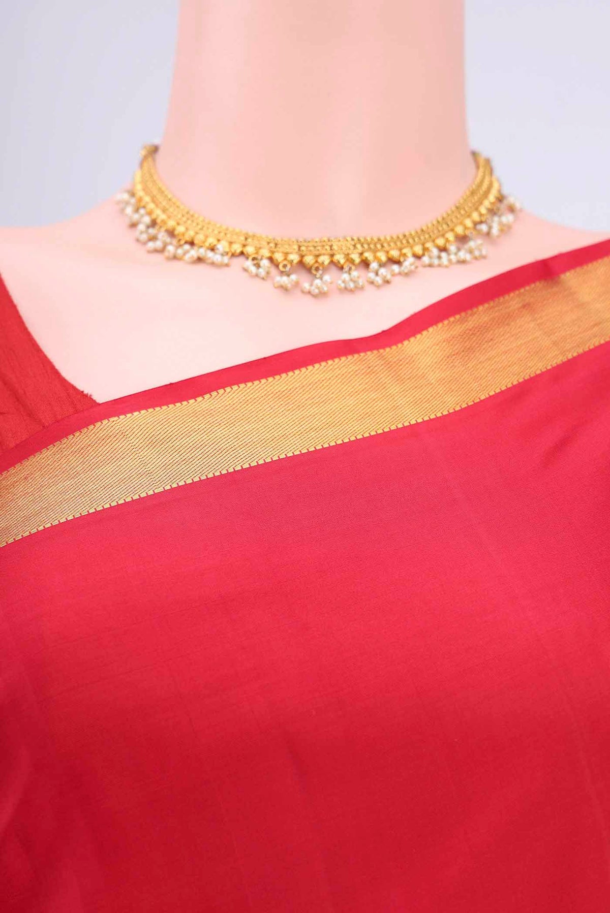 Border image of Red Kanchipuram Saree with Plain Body and Zari Border