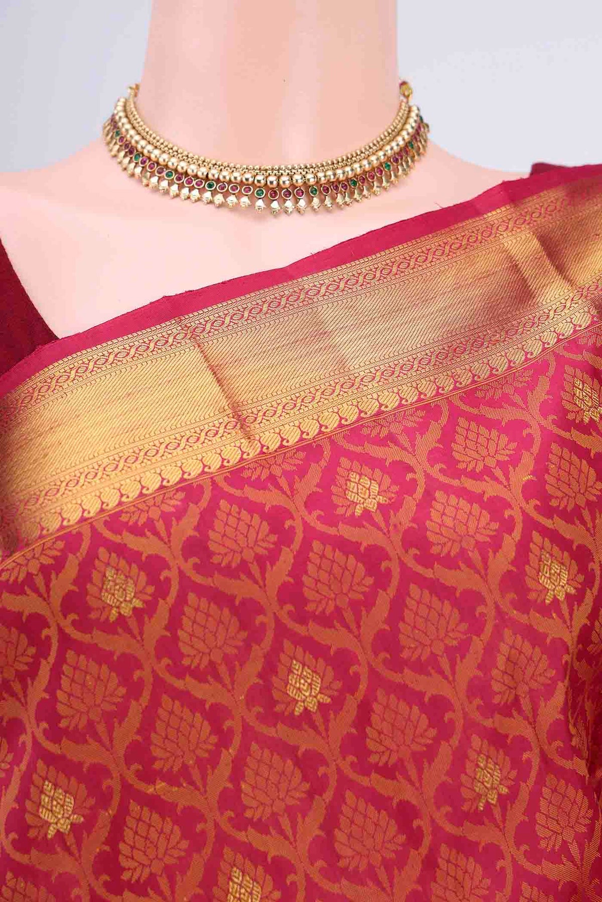 Border image of Maroon Kanchipuram Saree with Jacquard With Zari Butta on the body and Thread Border