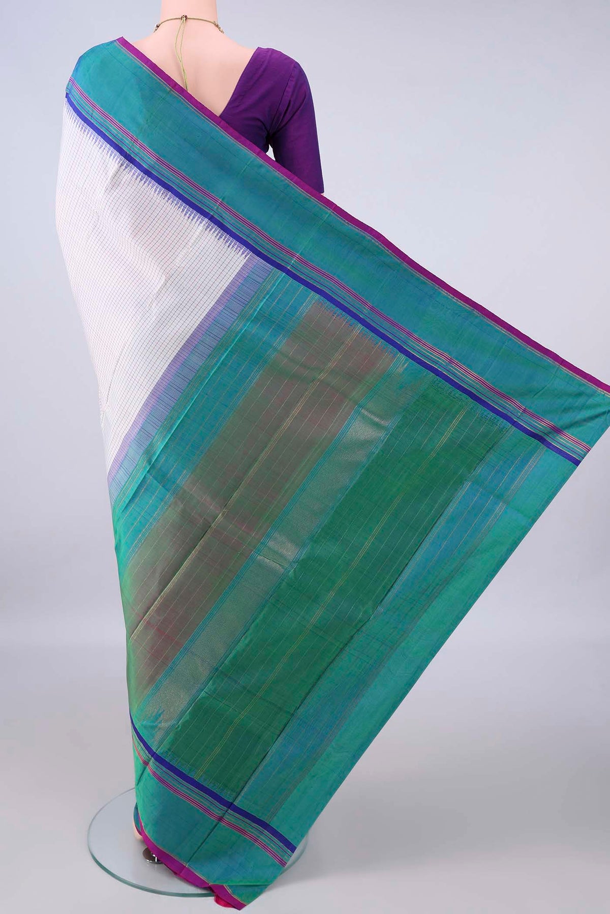 Flat view of Pure Silk Off White Kanjivaram Saree with Checked design on the body and Plain Border. 