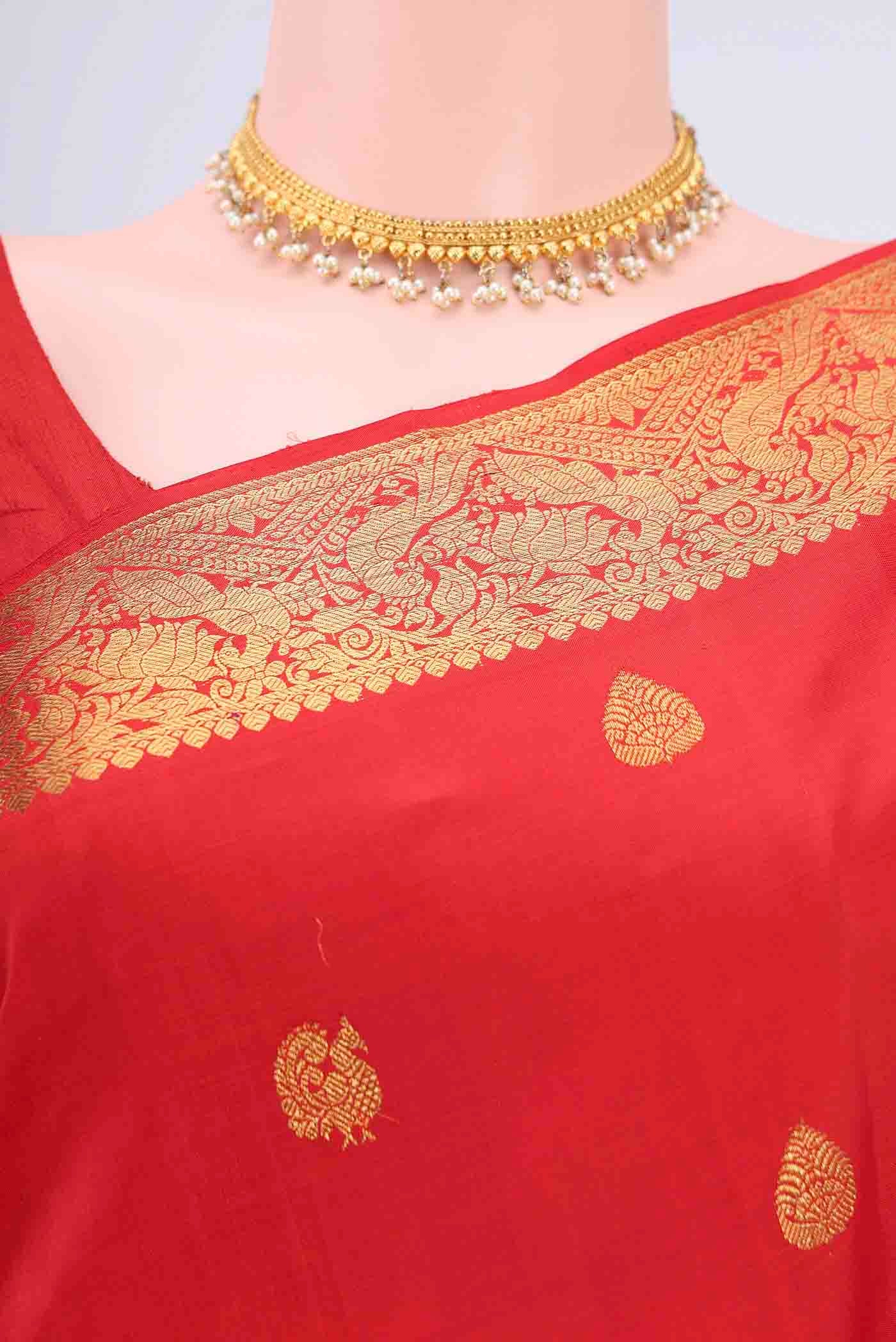 Border image of Imperial Red Kanchipuram Saree with Zari Butta on the body and Zari Border