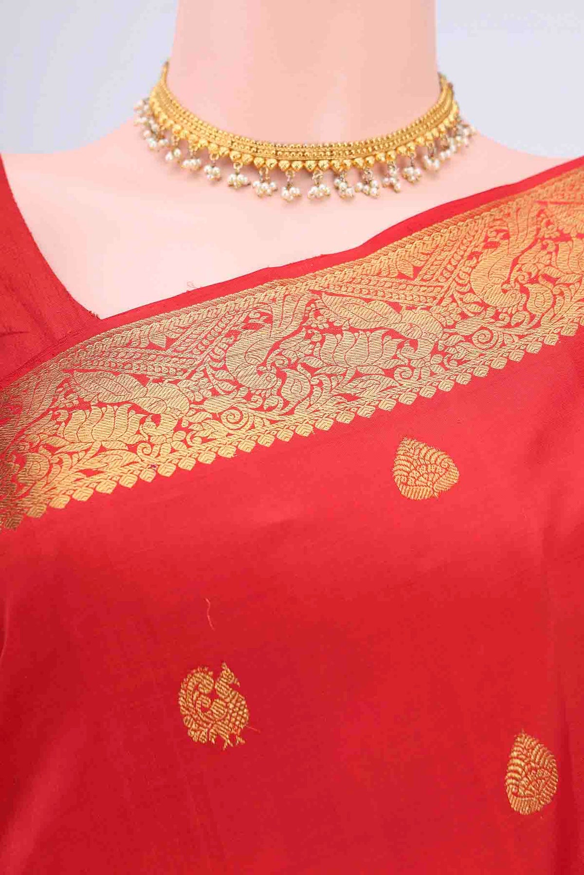 Border image of Imperial Red Kanchipuram Saree with Zari Butta on the body and Zari Border