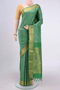 Green Kanjivaram Silk Saree with Jacquard With Zari Butta on the body and Zari Border.  displayed on a mannequin