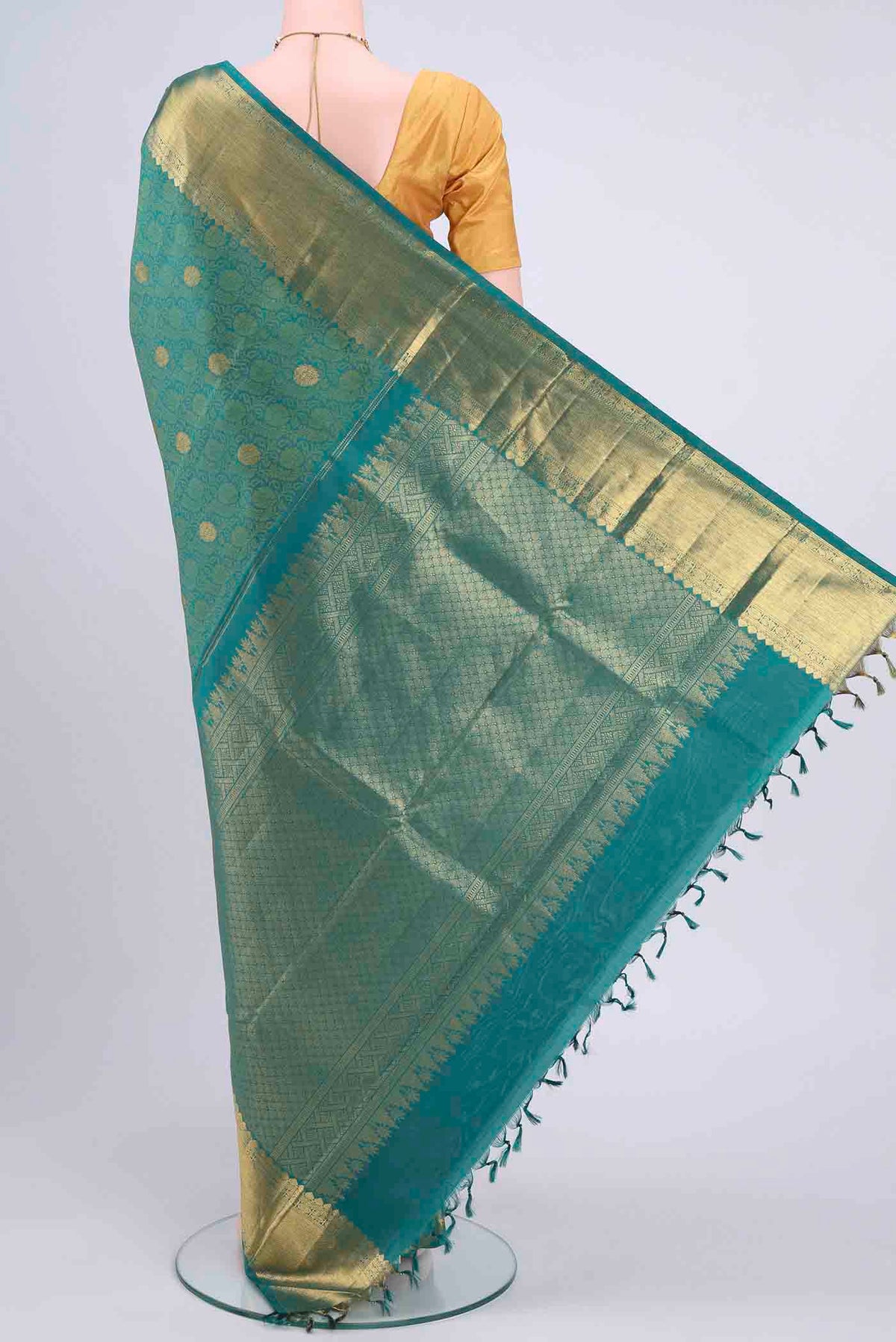 Flat view of Sea Green Kanchipuram Saree with Jacquard With Zari Butta on the body and Zari Border