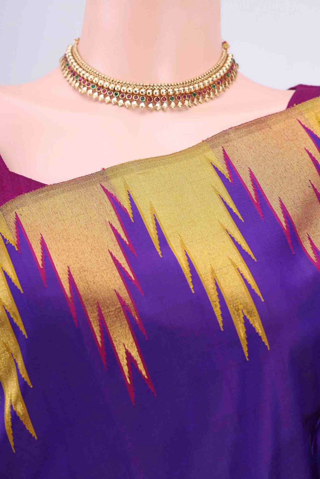 Border image of Purple Kanchipuram Saree with Plain Body and Temple Border
