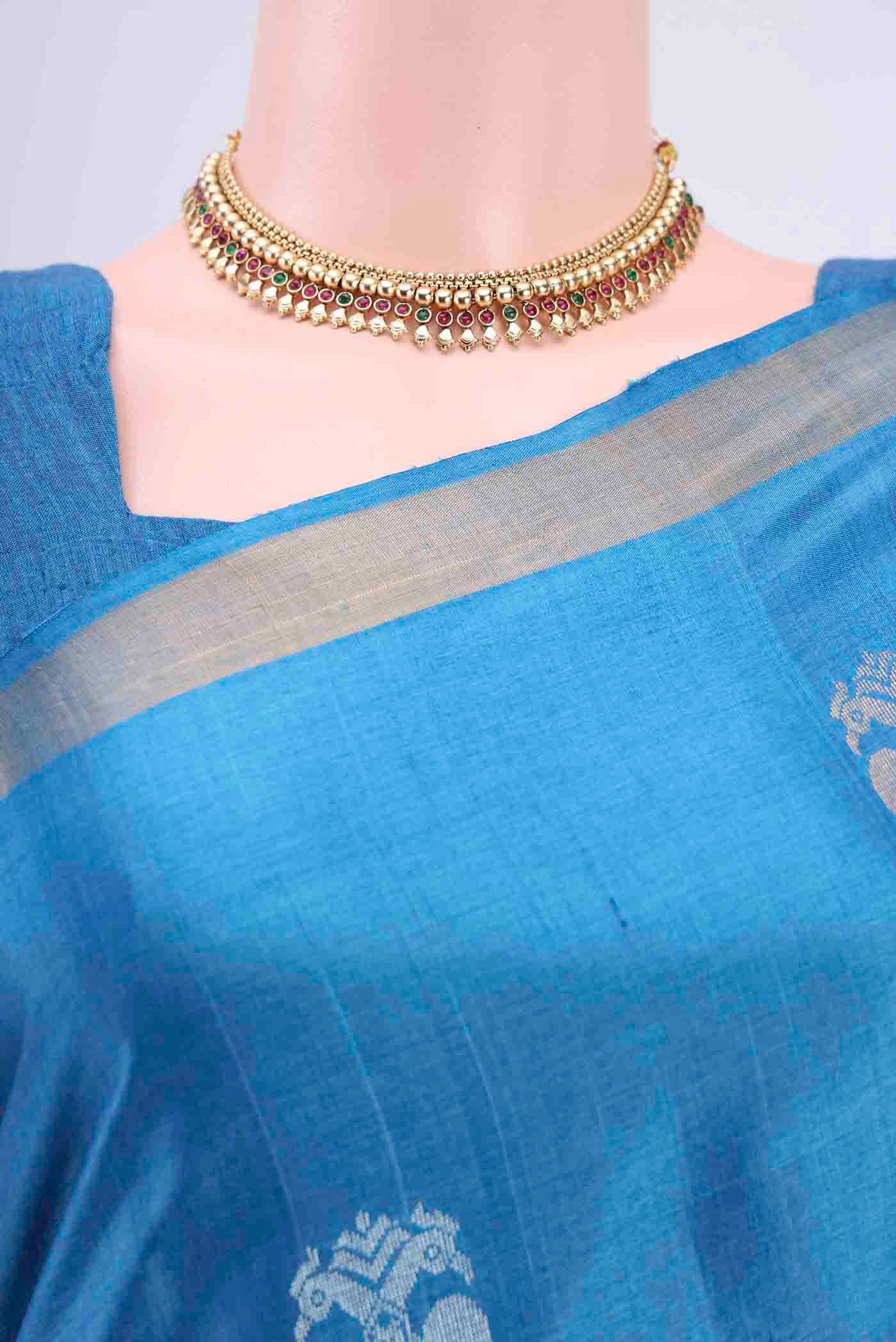 Border image of Blue Tussar Silk Saree with Zari Butta on the body and Zari Border