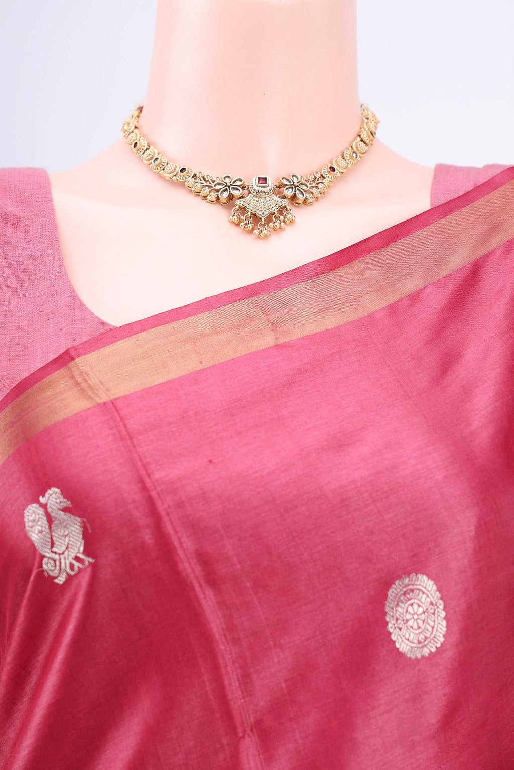 Border image of Dark Pink Tussar Silk Saree with Zari Butta on the body and Zari Border. 