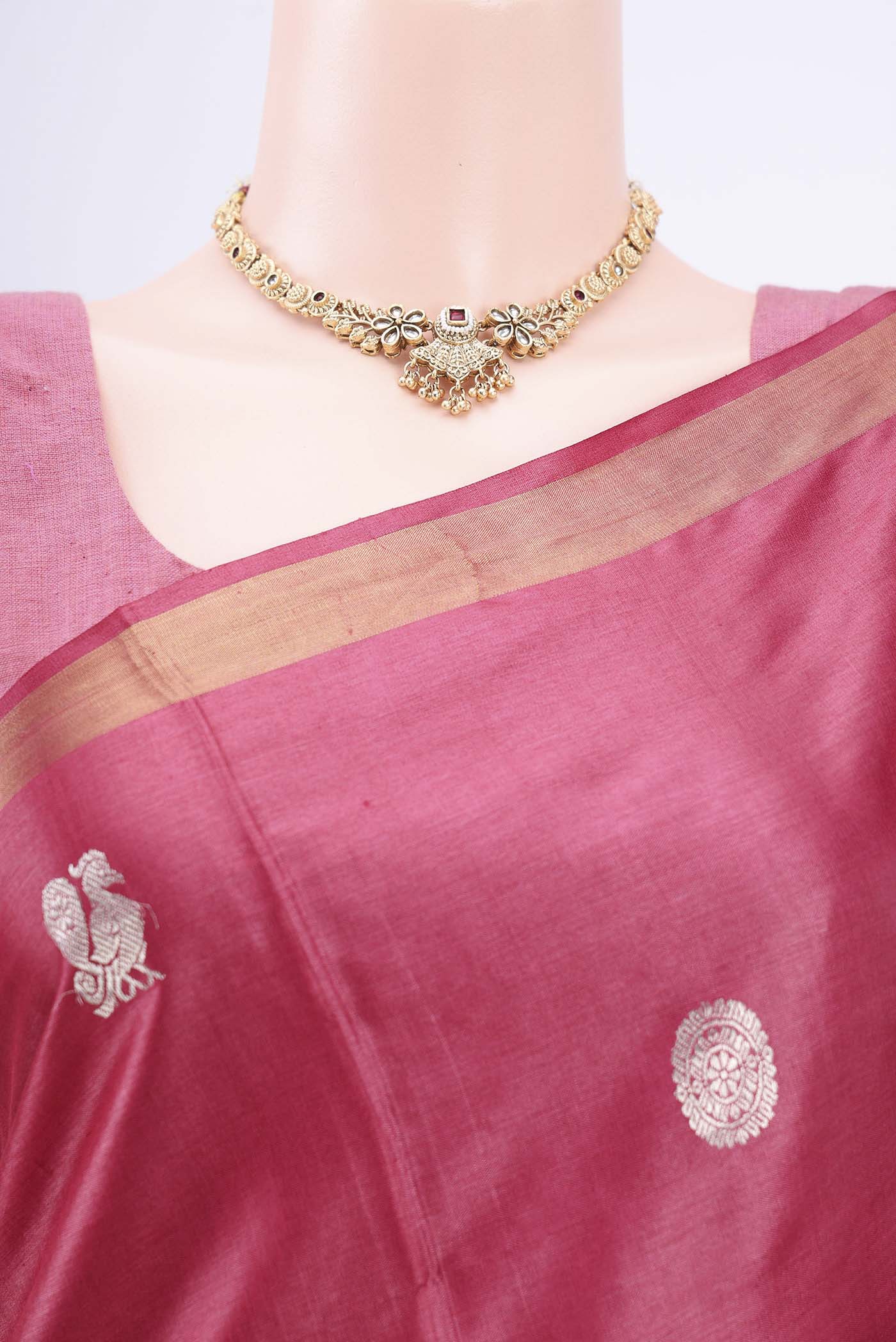 Border image of Dark Pink Tussar Silk Saree with Zari Butta on the body and Zari Border. 