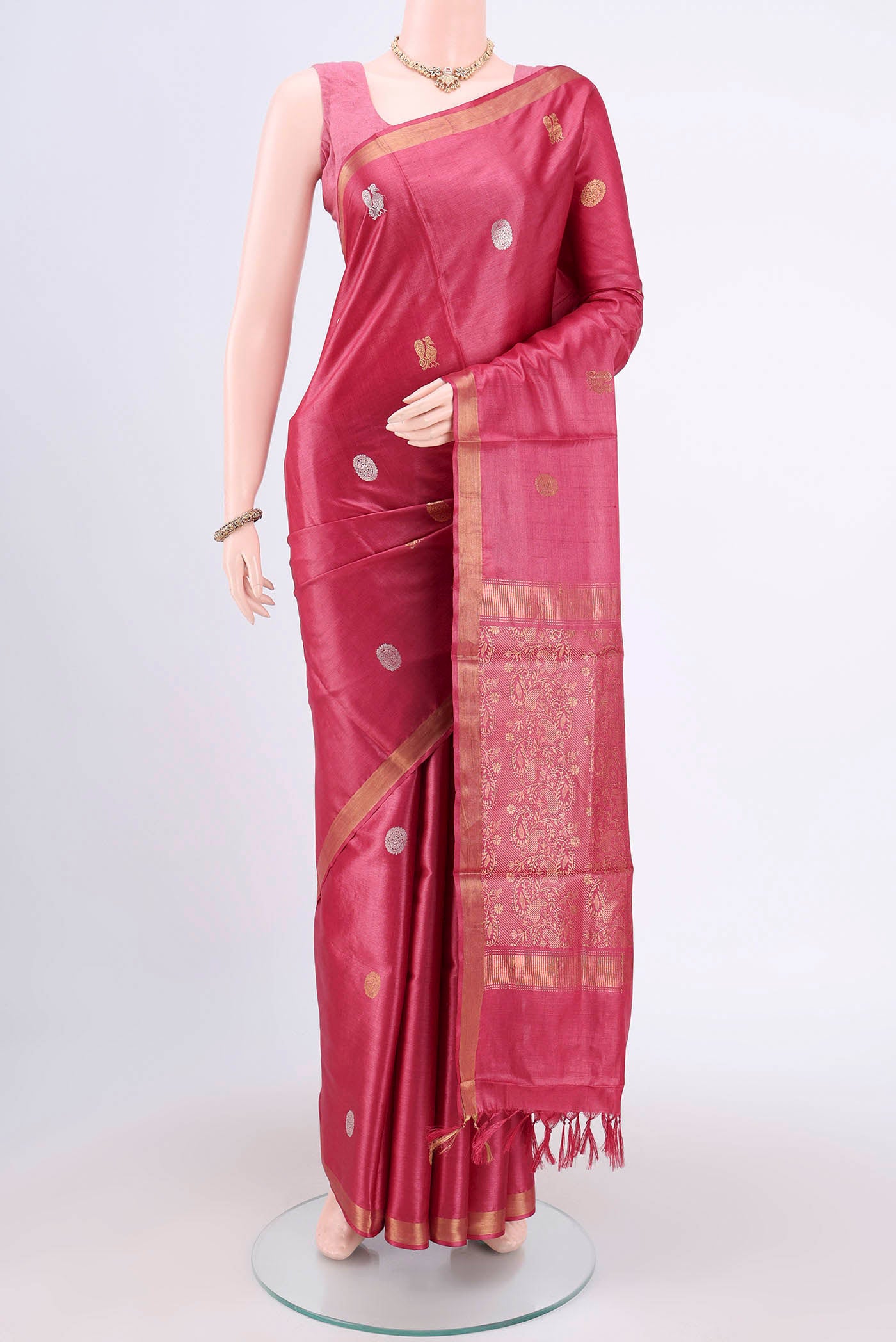 Dark Pink Tussar Silk Saree with Zari Butta on the body and Zari Border.  displayed on a mannequin