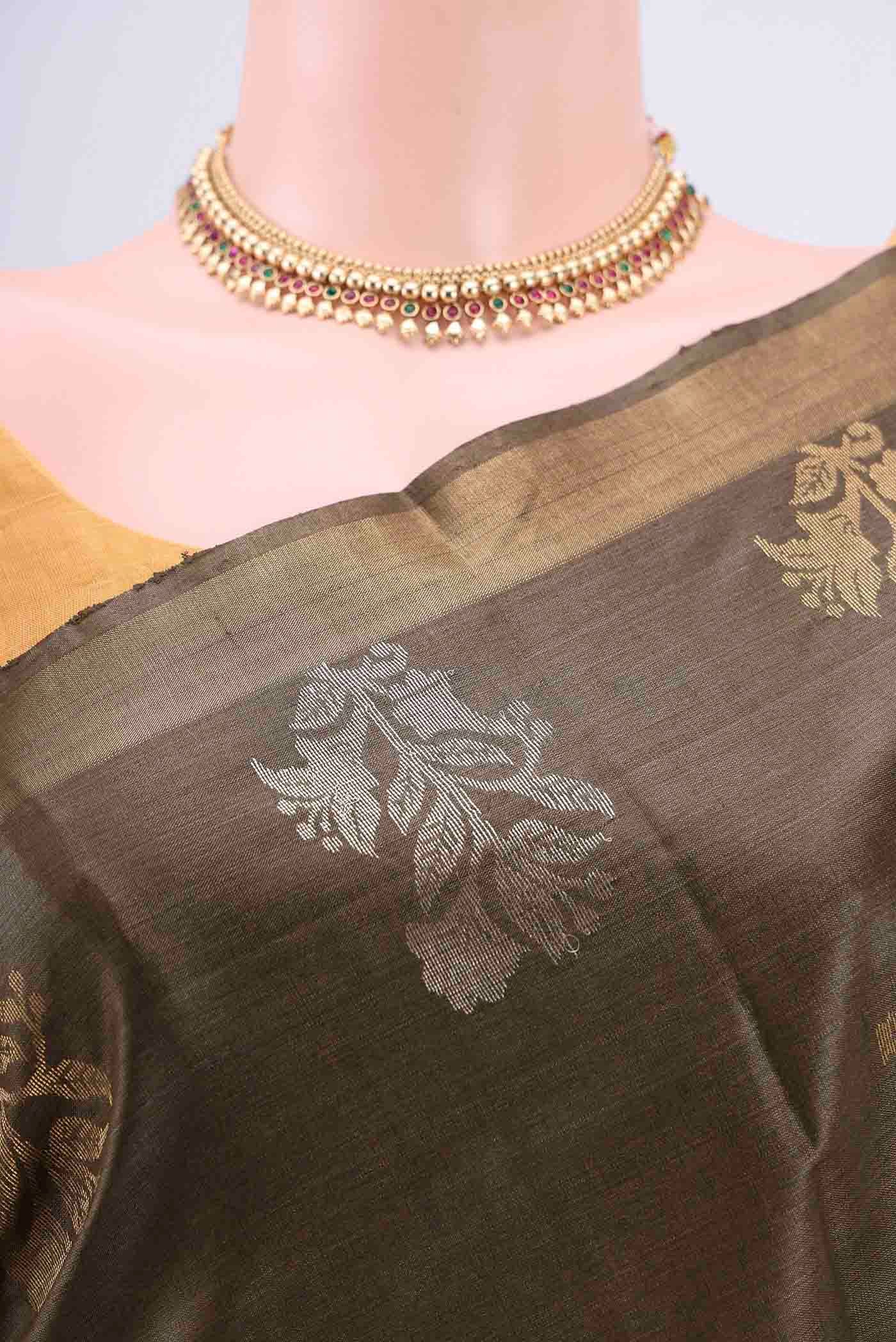 Border image of Mehandi Green Tussar Silk Saree with Zari Butta on the body and Zari Border