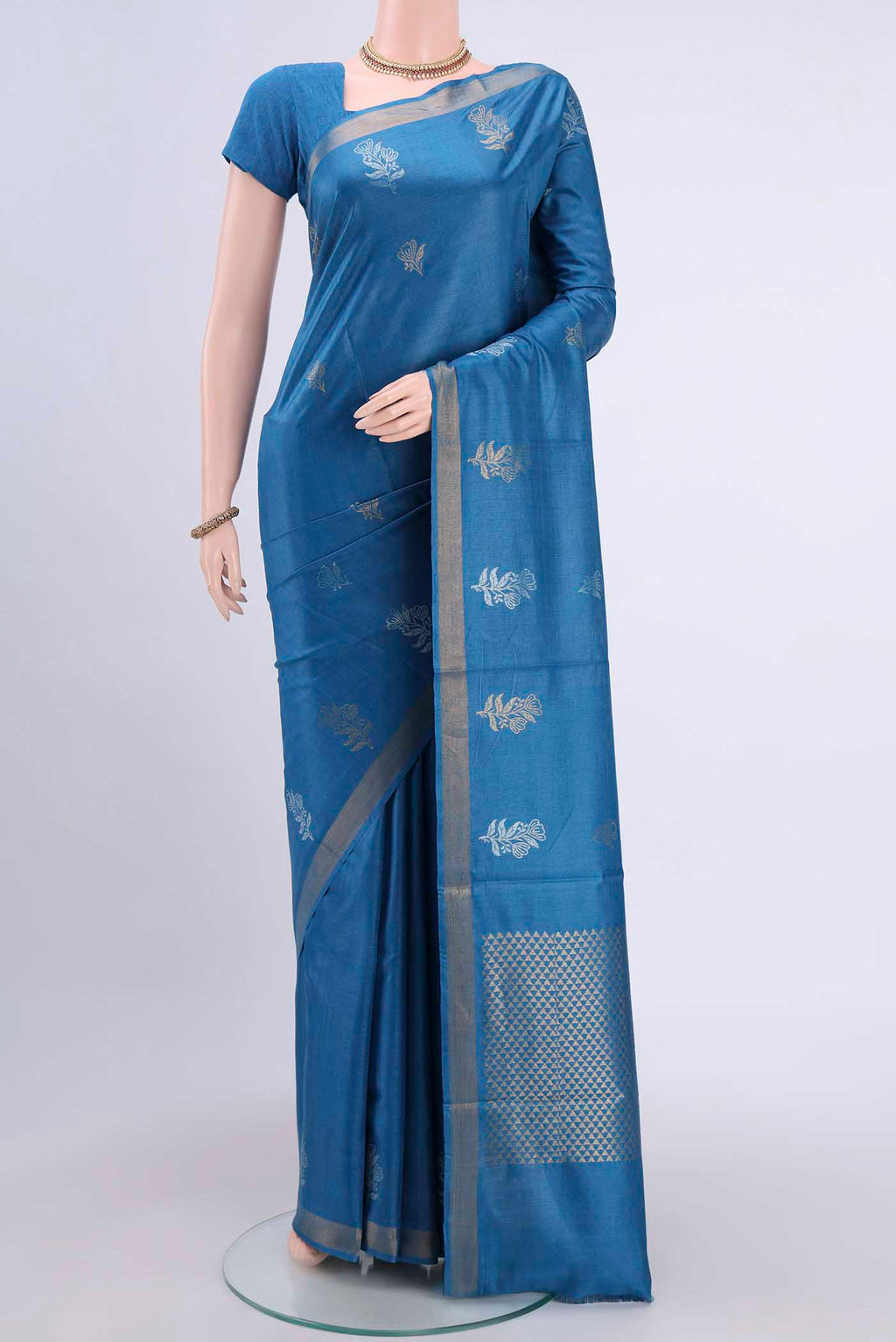 Royal Blue Tussar Silk Saree with Zari Butta on the body and Zari Border displayed on a mannequin