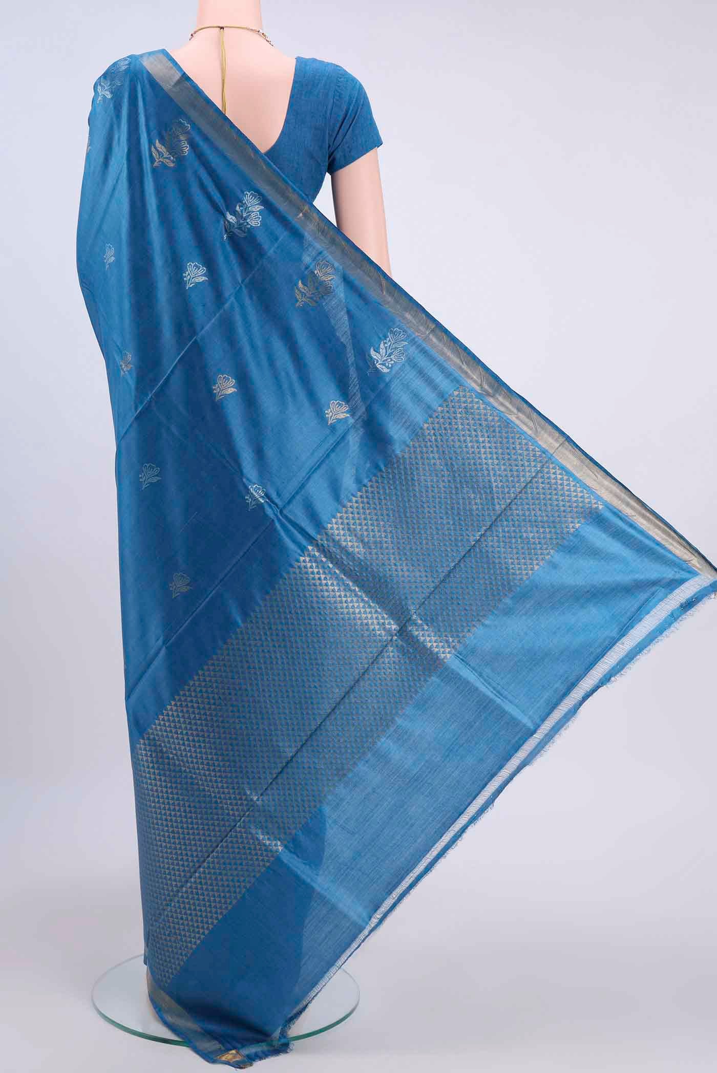 Flat view of Royal Blue Tussar Silk Saree with Zari Butta on the body and Zari Border