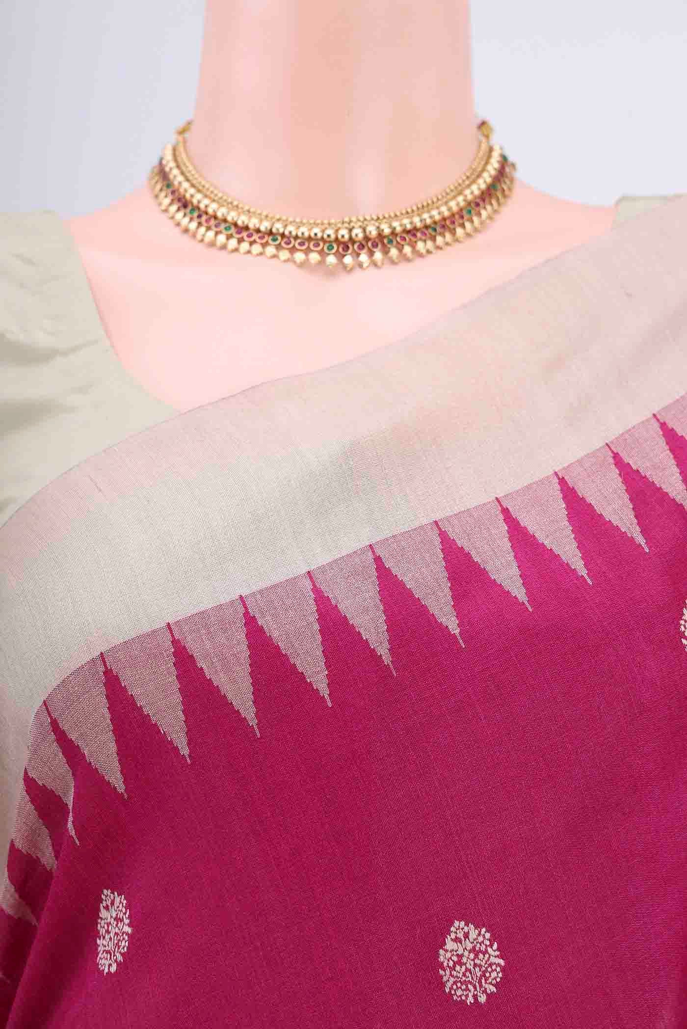 Border image of Rani Pink Tussar Silk Saree with Thread Butta on the body and Zari Border
