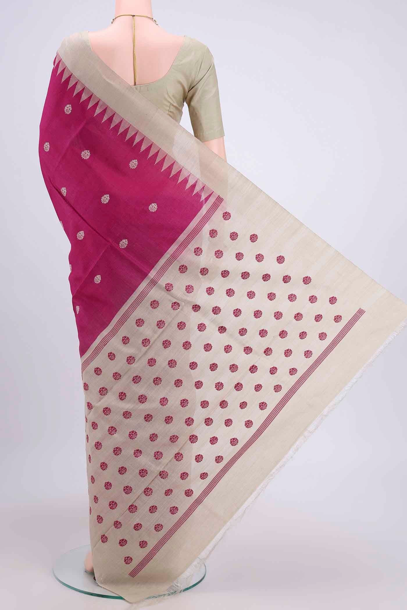 Flat view of Rani Pink Tussar Silk Saree with Thread Butta on the body and Zari Border