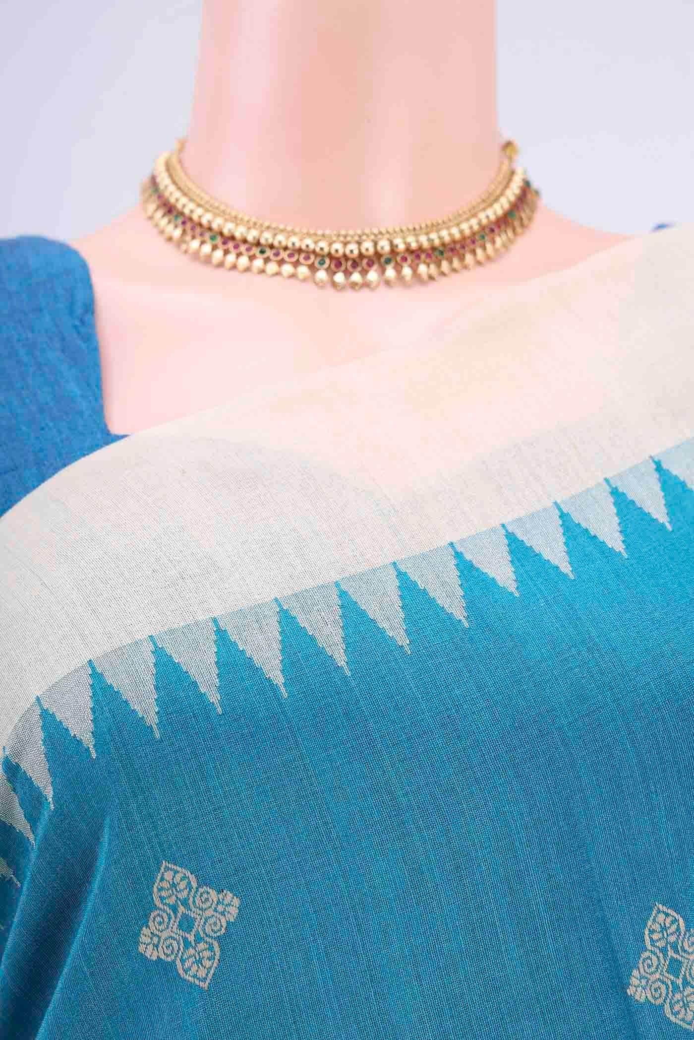 Border image of Blue Tussar Silk Saree with Thread Butta on the body and Zari Border