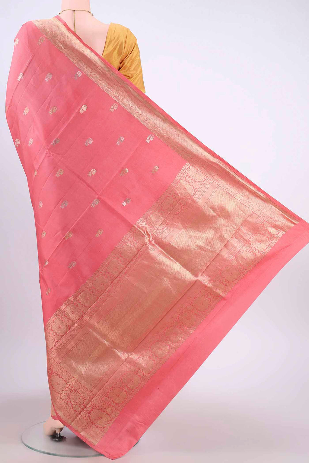 Flat view of Peach Banarasi Katan Silk Saree with Zari Butta on the body and Silk Border