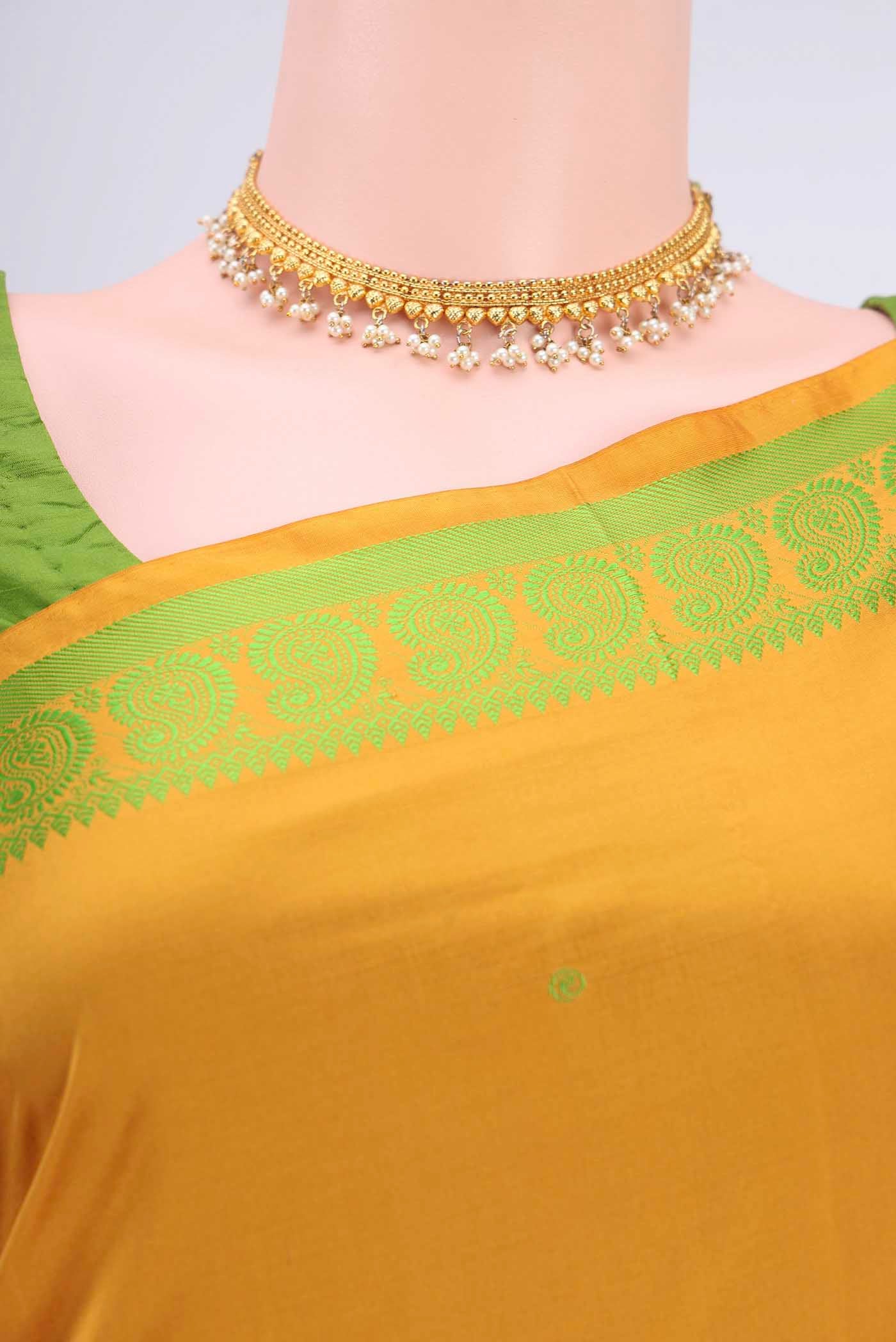 Border image of Mustard Kanchipuram Silk Saree with Thread Butta on the body and Thread Border