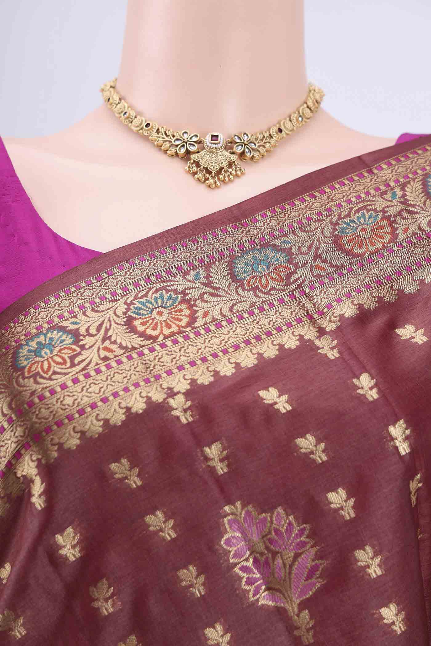 Border image of Brown Banarasi Tussar Silk Saree with Zari Butta on the body and Zari Border. 