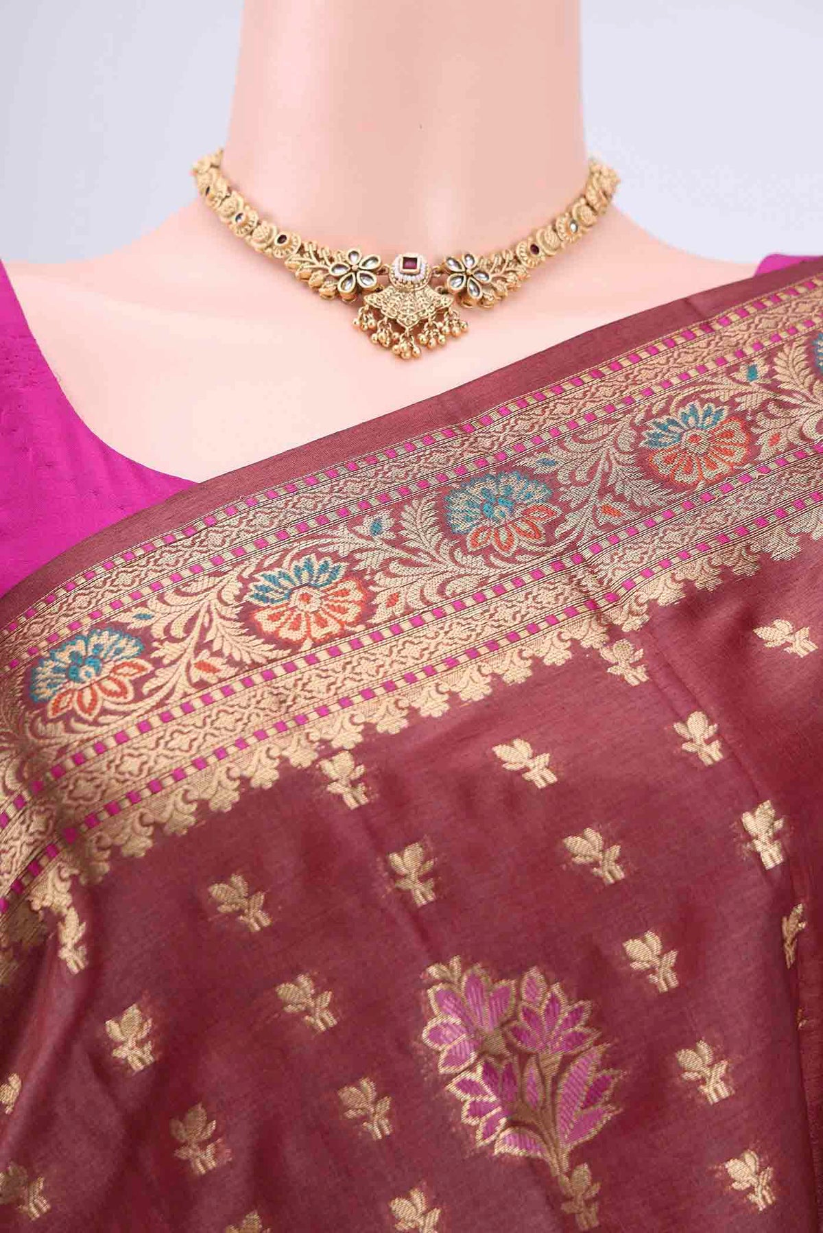 Border image of Brown Banarasi Tussar Silk Saree with Zari Butta on the body and Zari Border. 