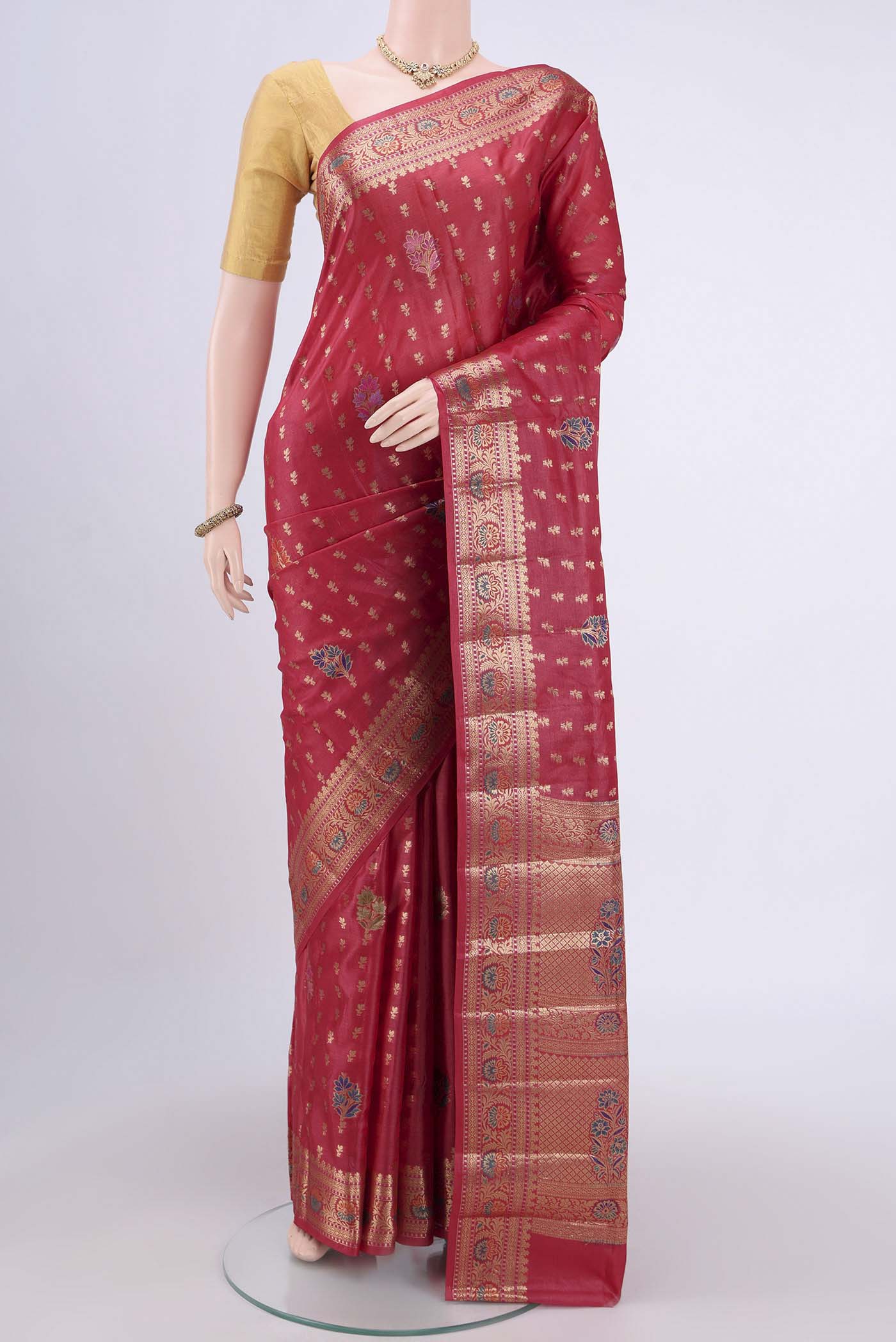 Red Banarasi Raw Silk Saree with Zari Brocade on the body and Zari Border.  displayed on a mannequin