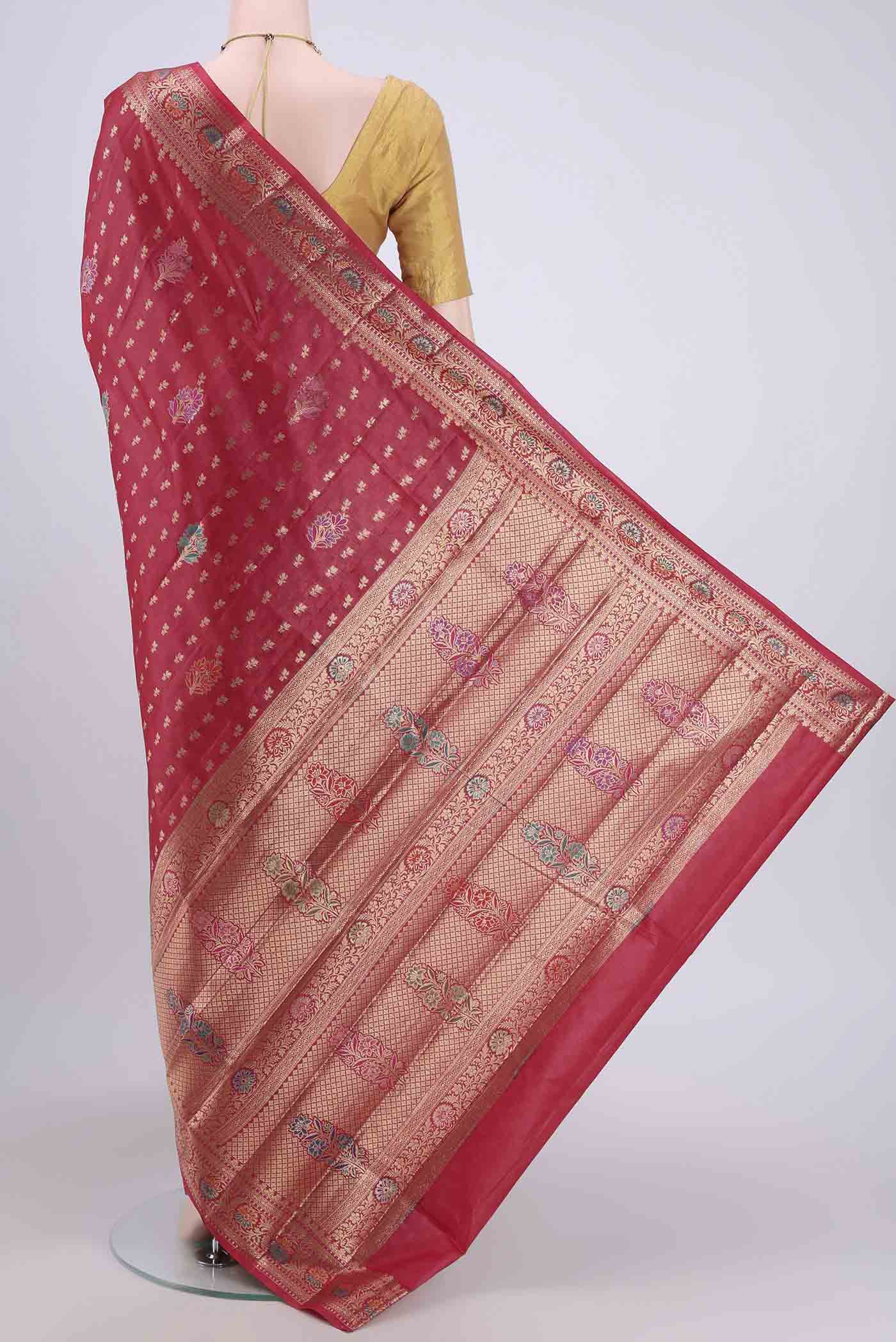 Flat view of Red Banarasi Raw Silk Saree with Zari Brocade on the body and Zari Border. 