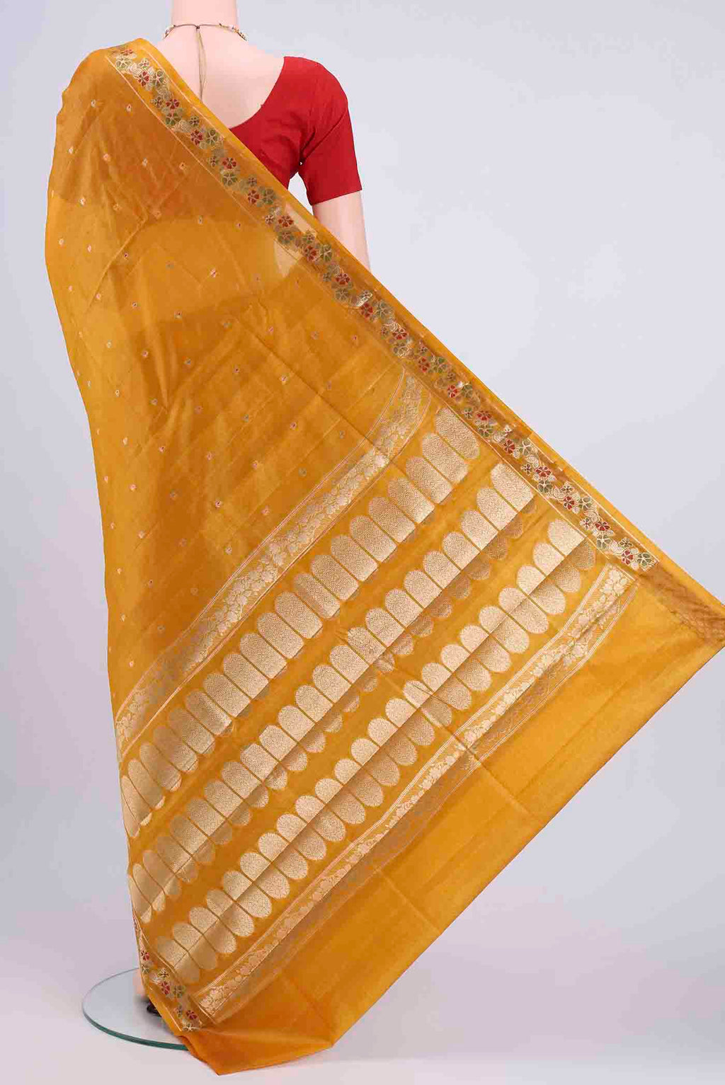 Flat view of Mustard Banarasi Tussar Silk Saree with Zari Butta on the body and Zari Border