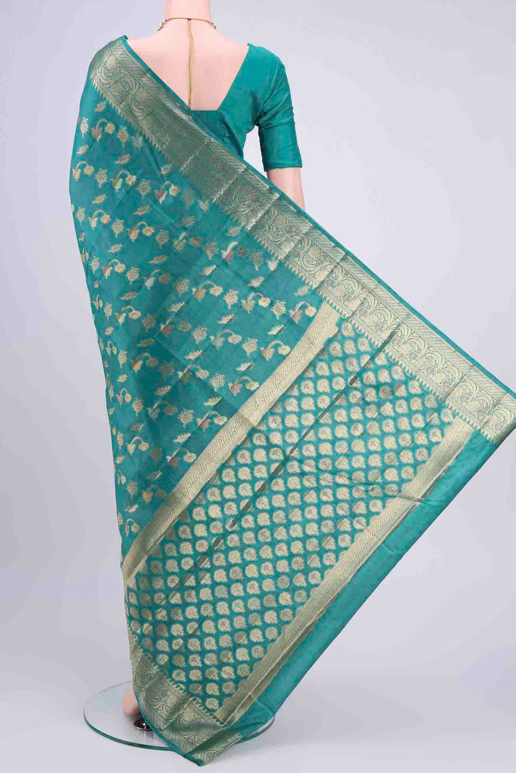 Flat view of Blue Banarasi Tussar Silk Saree with Zari Butta on the body and Zari Border