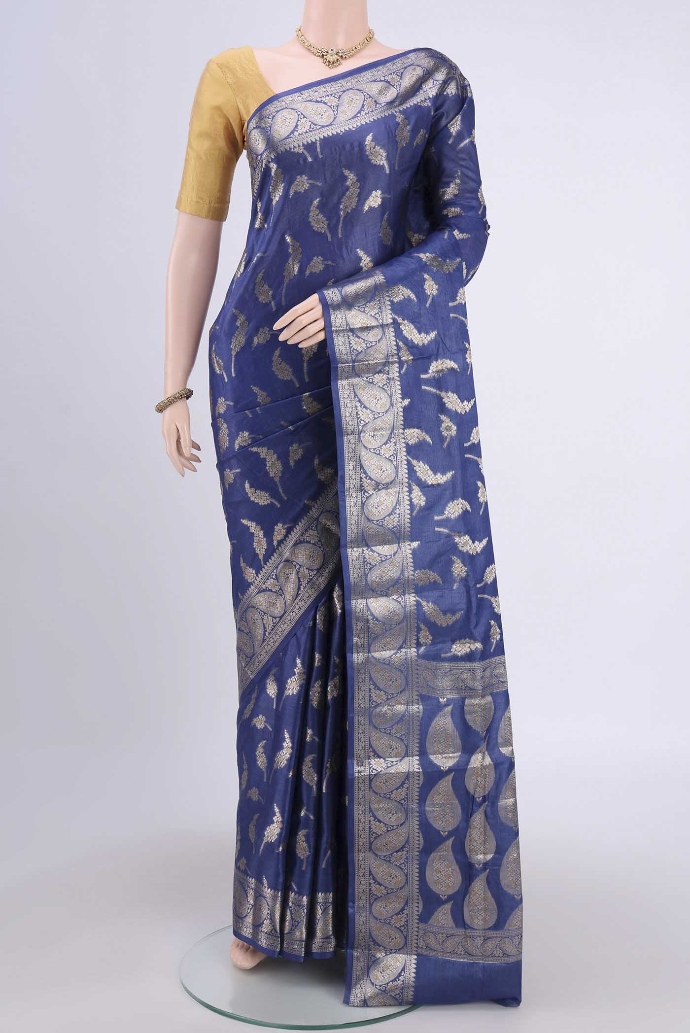 Royal Blue Banarasi Tussar Silk Saree with Zari Butta on the body and Zari Border.  displayed on a mannequin