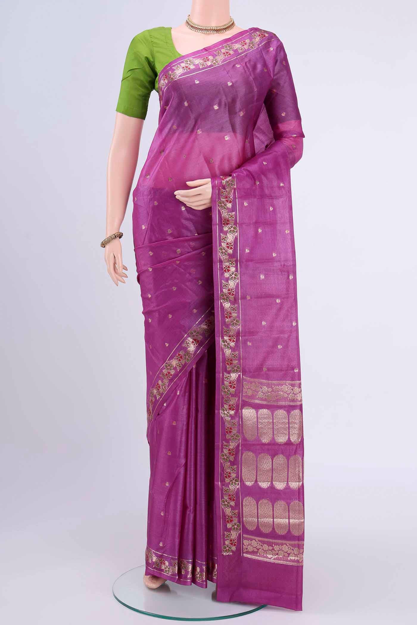 Mauve Banarasi Tussar Silk Saree with Zari Butta on the body and Zari Border displayed on a mannequin